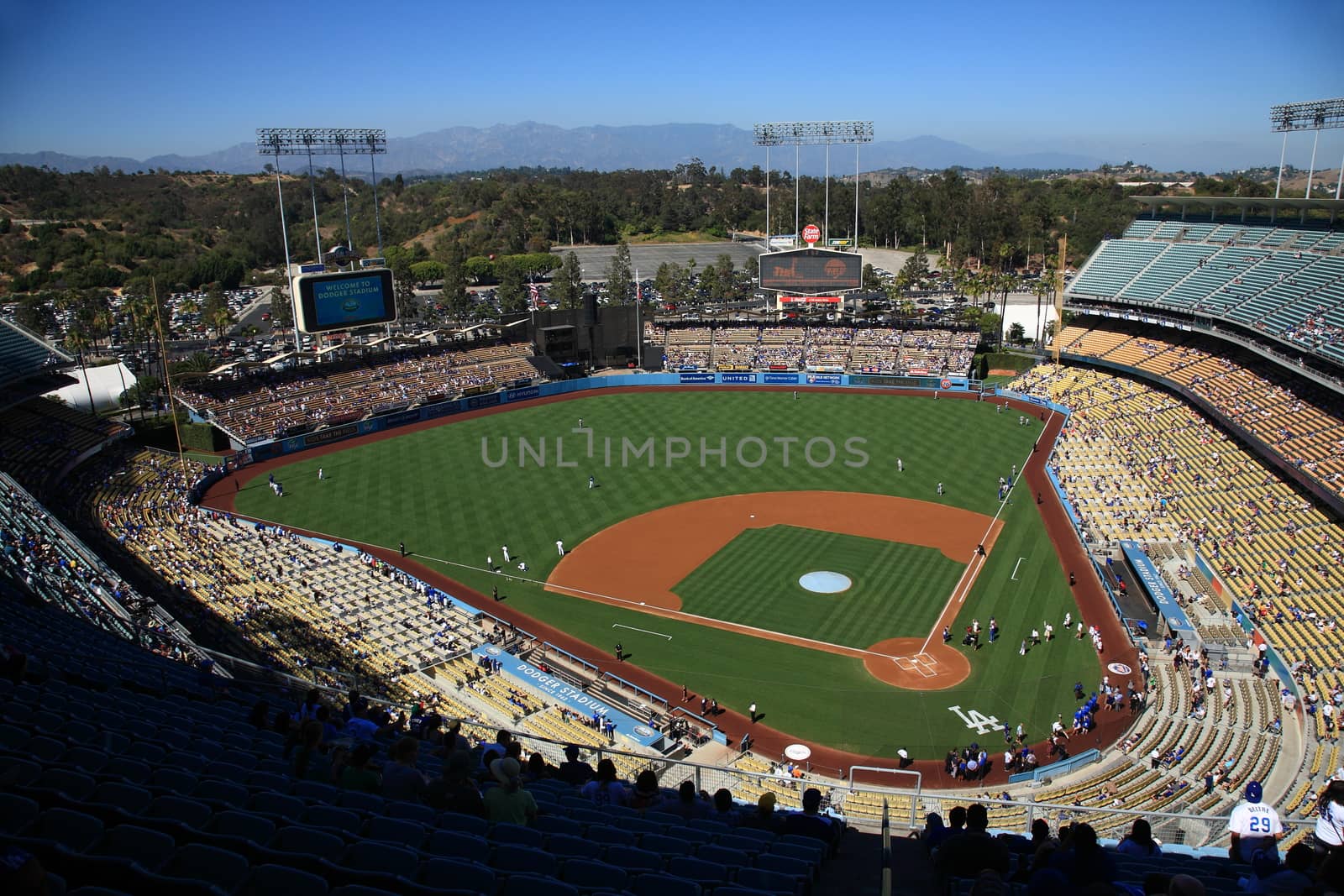 Dodger Stadium on a sunny day in Los Angeles before a baseball game.