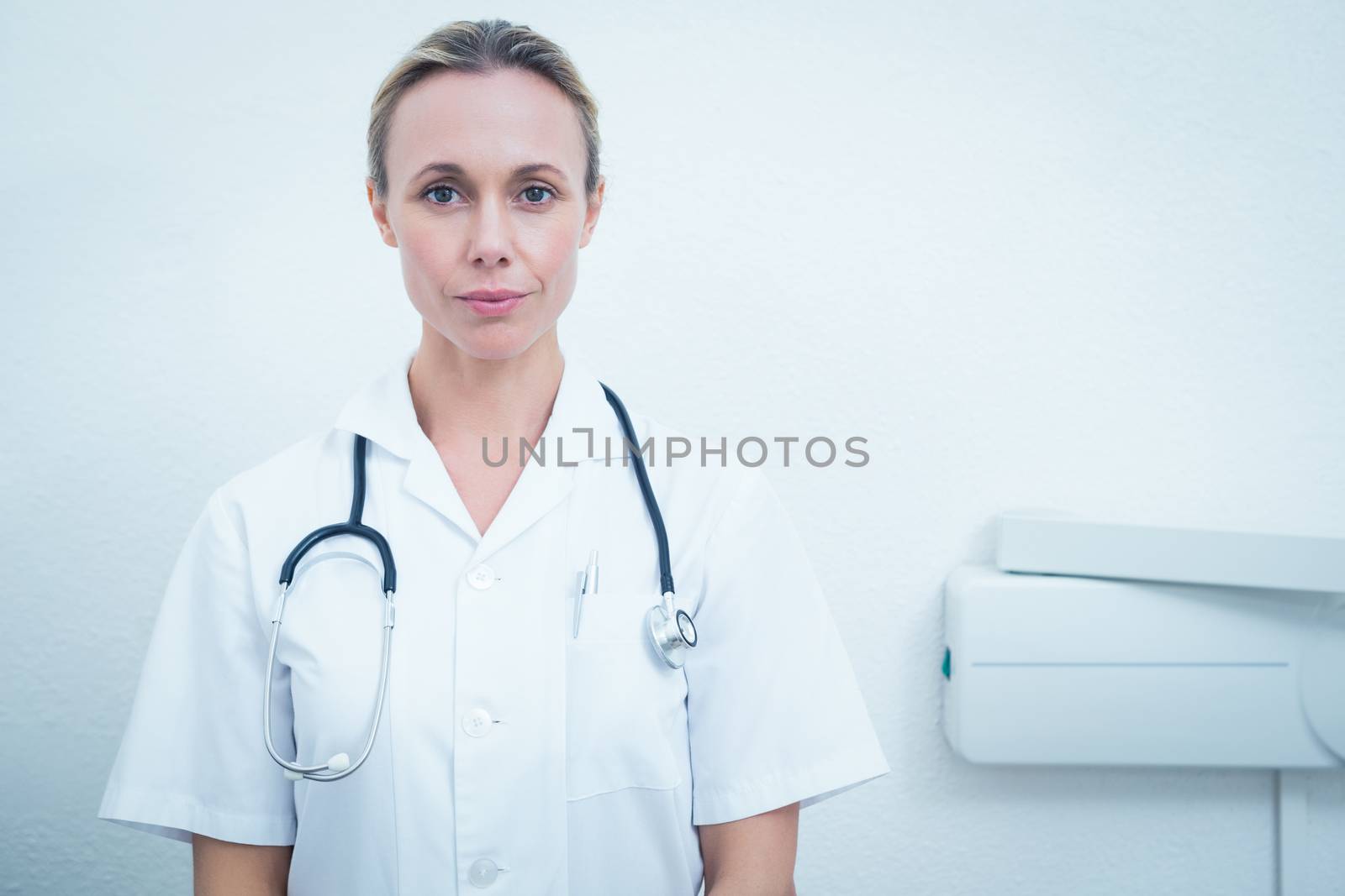 Portrait of serious female dentist by Wavebreakmedia