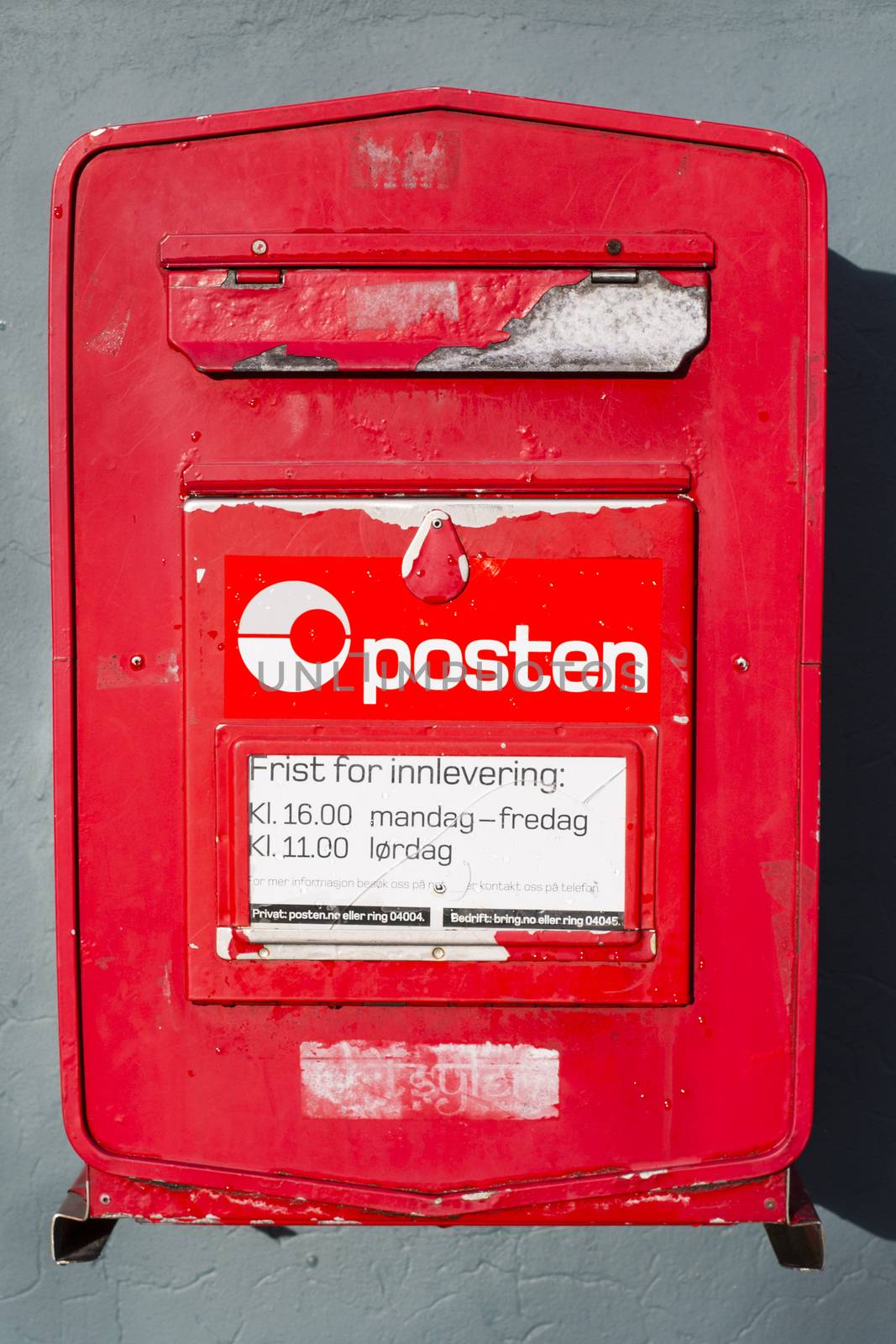 Red Norwegian Mail Post Box Mounted on a Builiding Wall in Stavanger Norway
