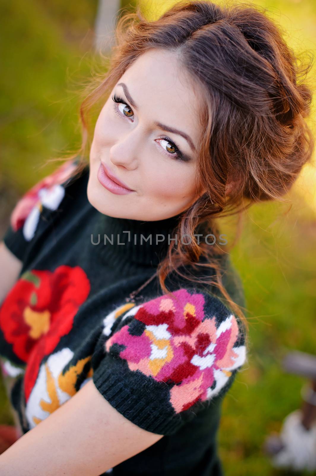 portrait of beautiful girl on nature background by timonko