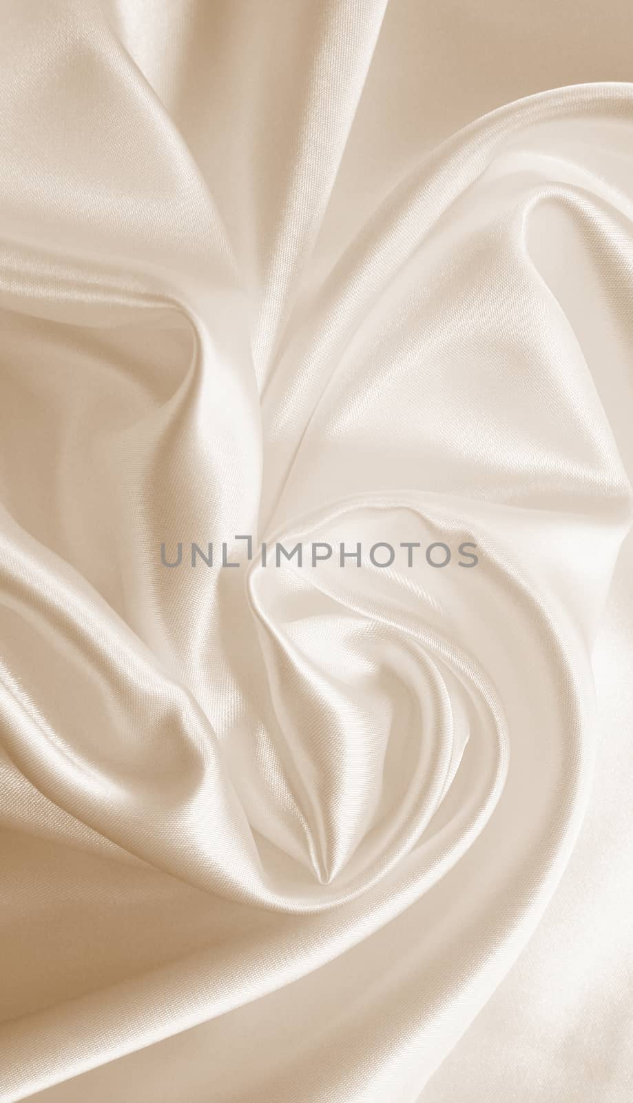 Smooth elegant golden silk as wedding background. In Sepia toned by oxanatravel