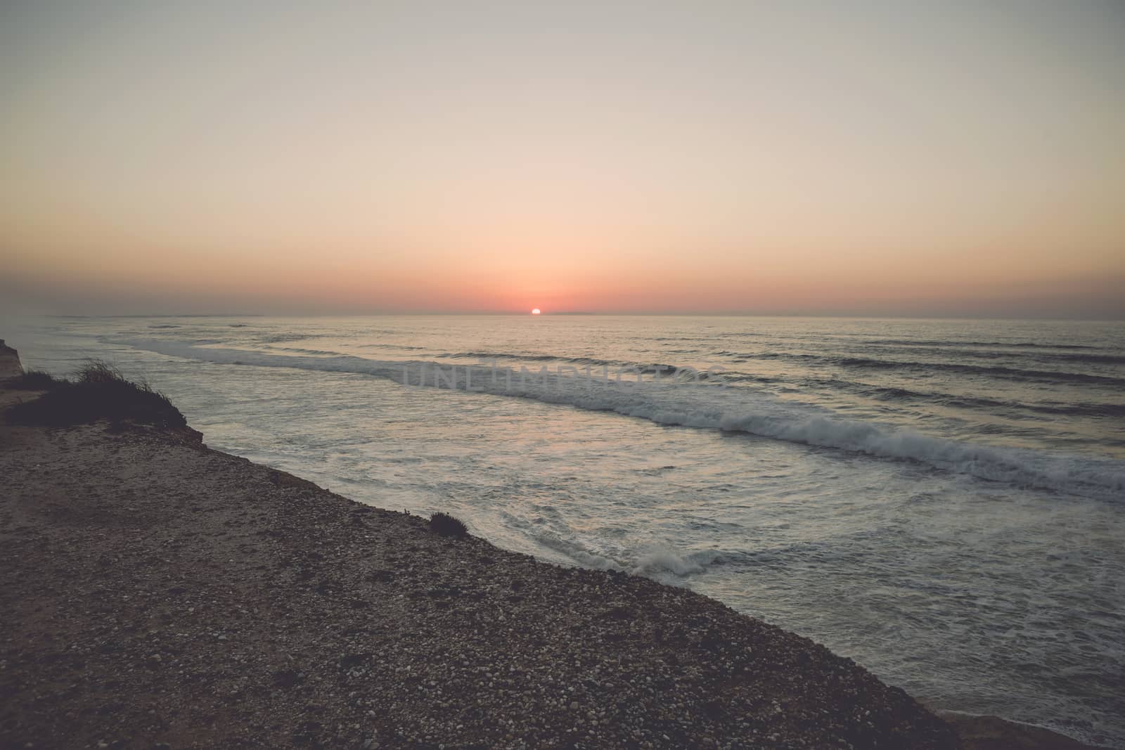 Beautiful orange sunset at the beach 