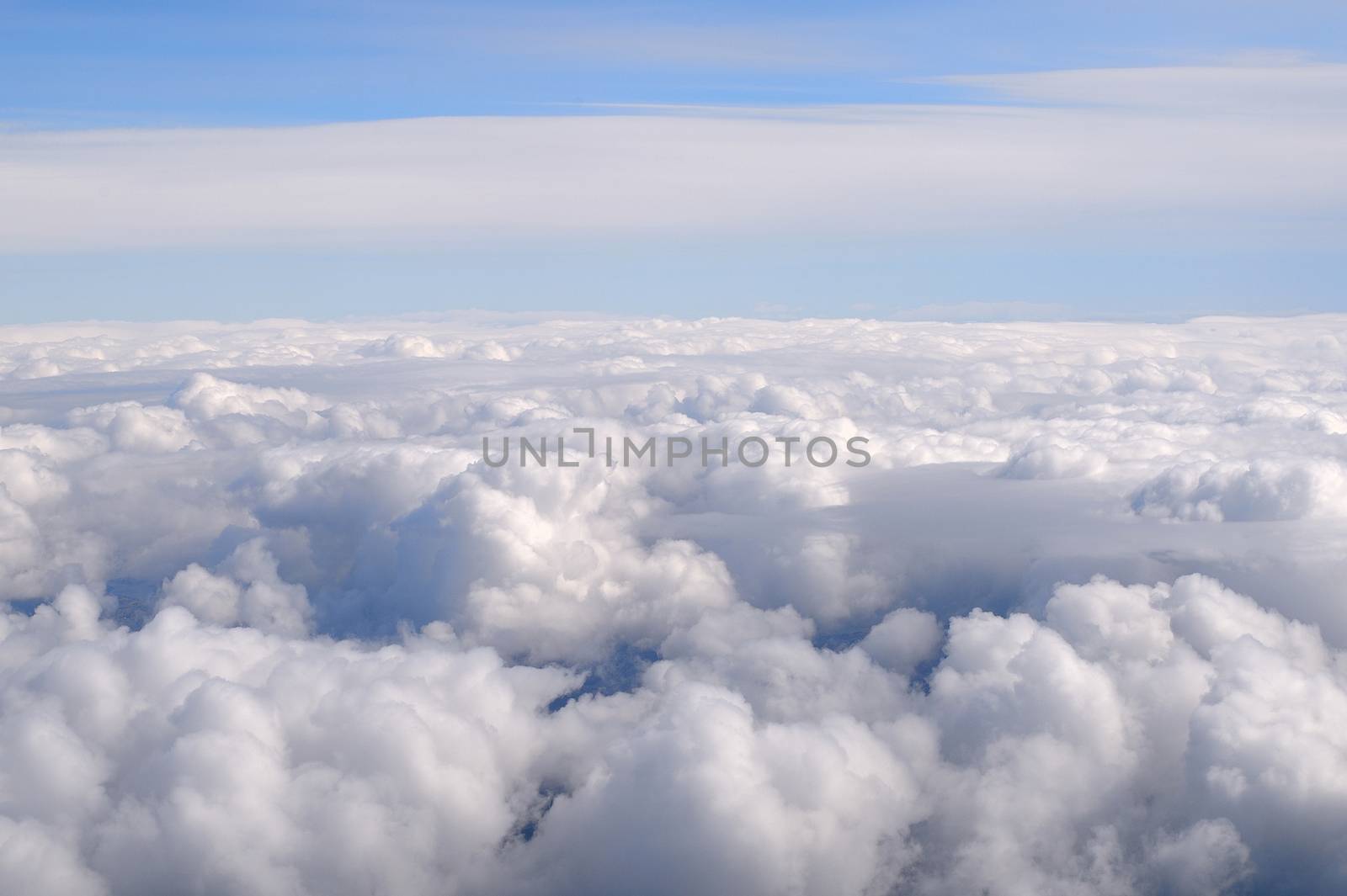 Flying High Above the Clouds Over the North Sea by Whiteboxmedia