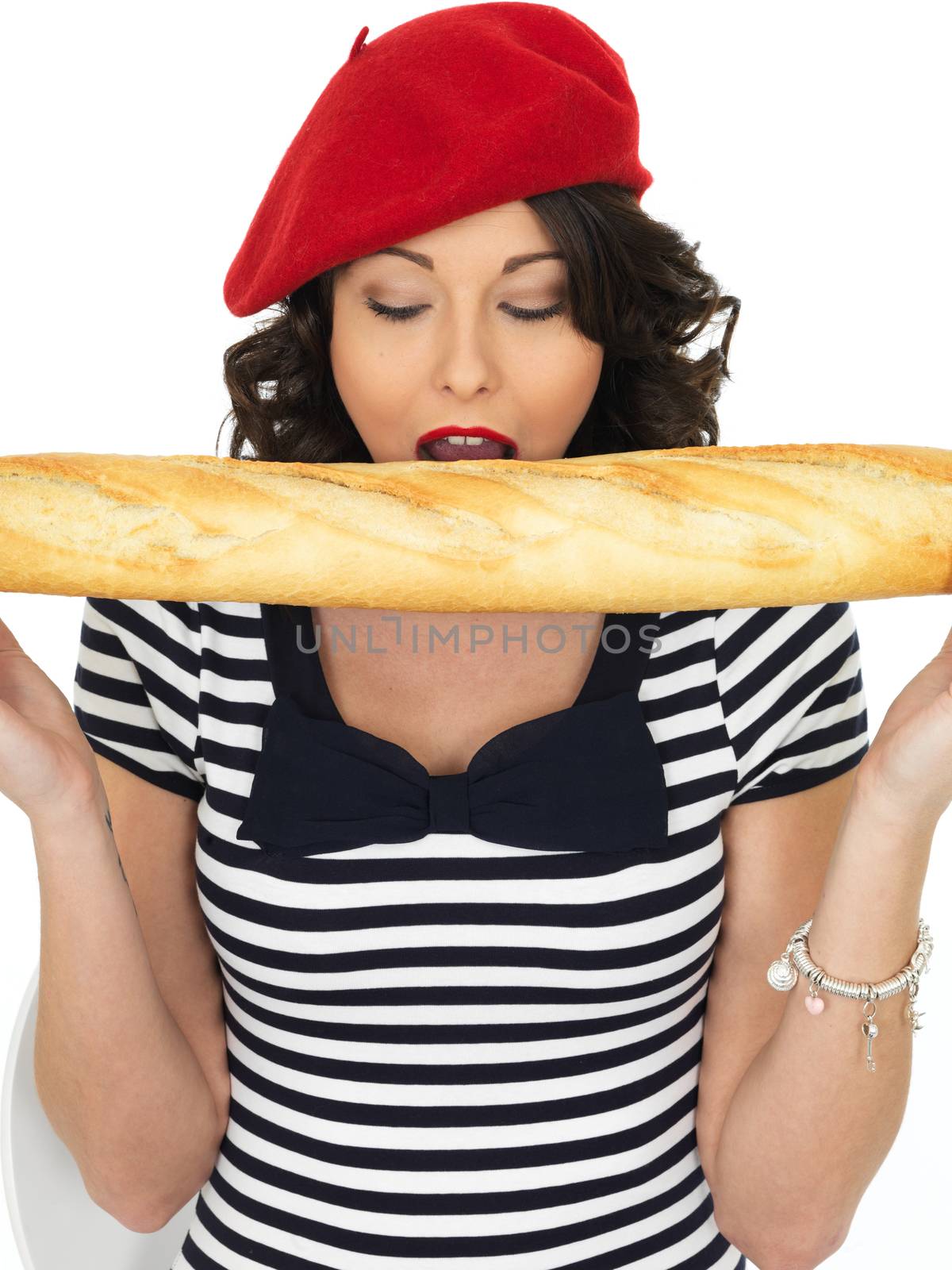 Attractive Happy Young Woman Eating a French Stick Bread Loaf