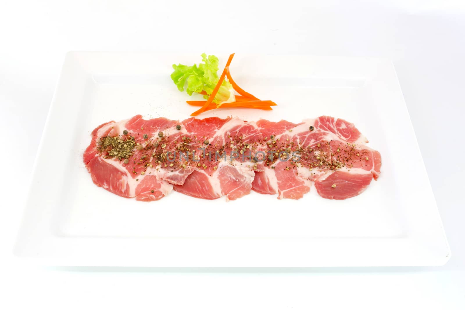 freshness slided pork on white dish for grill