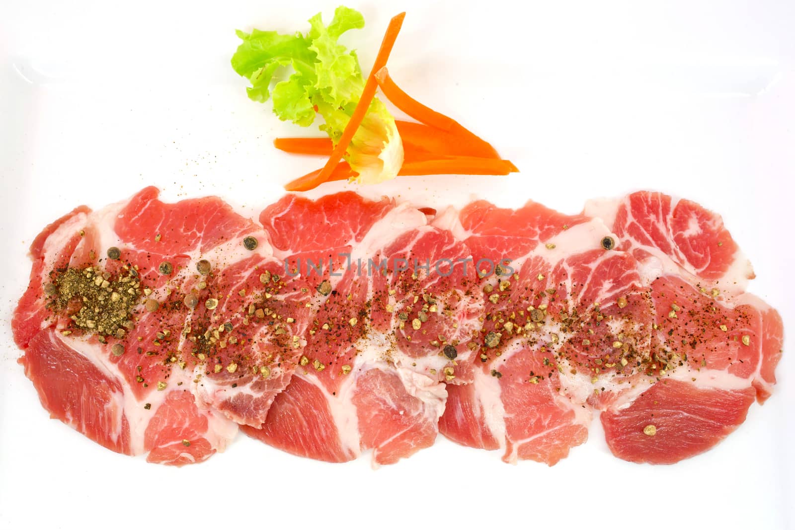 freshness slided pork on white dish for grill