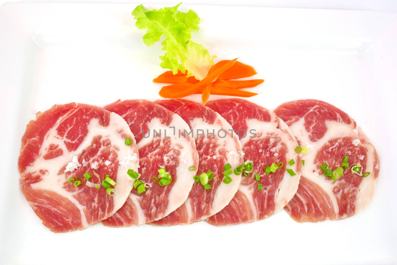 freshness slided pork on white dish for grill