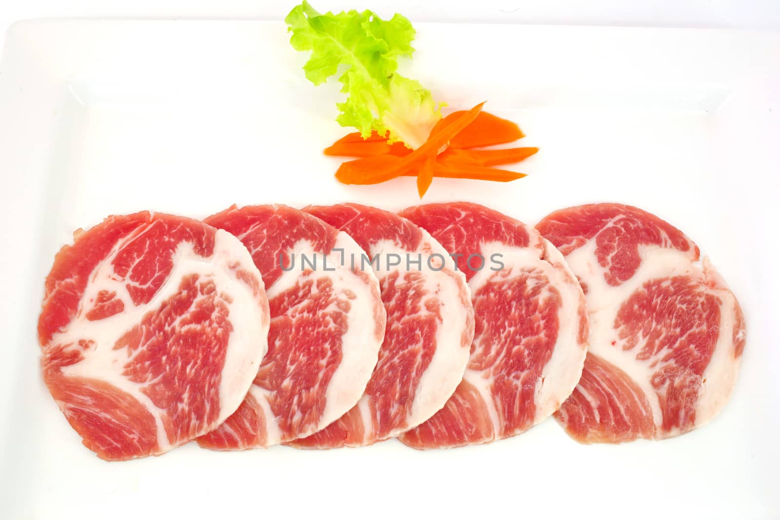 freshness slided pork on white dish for grill