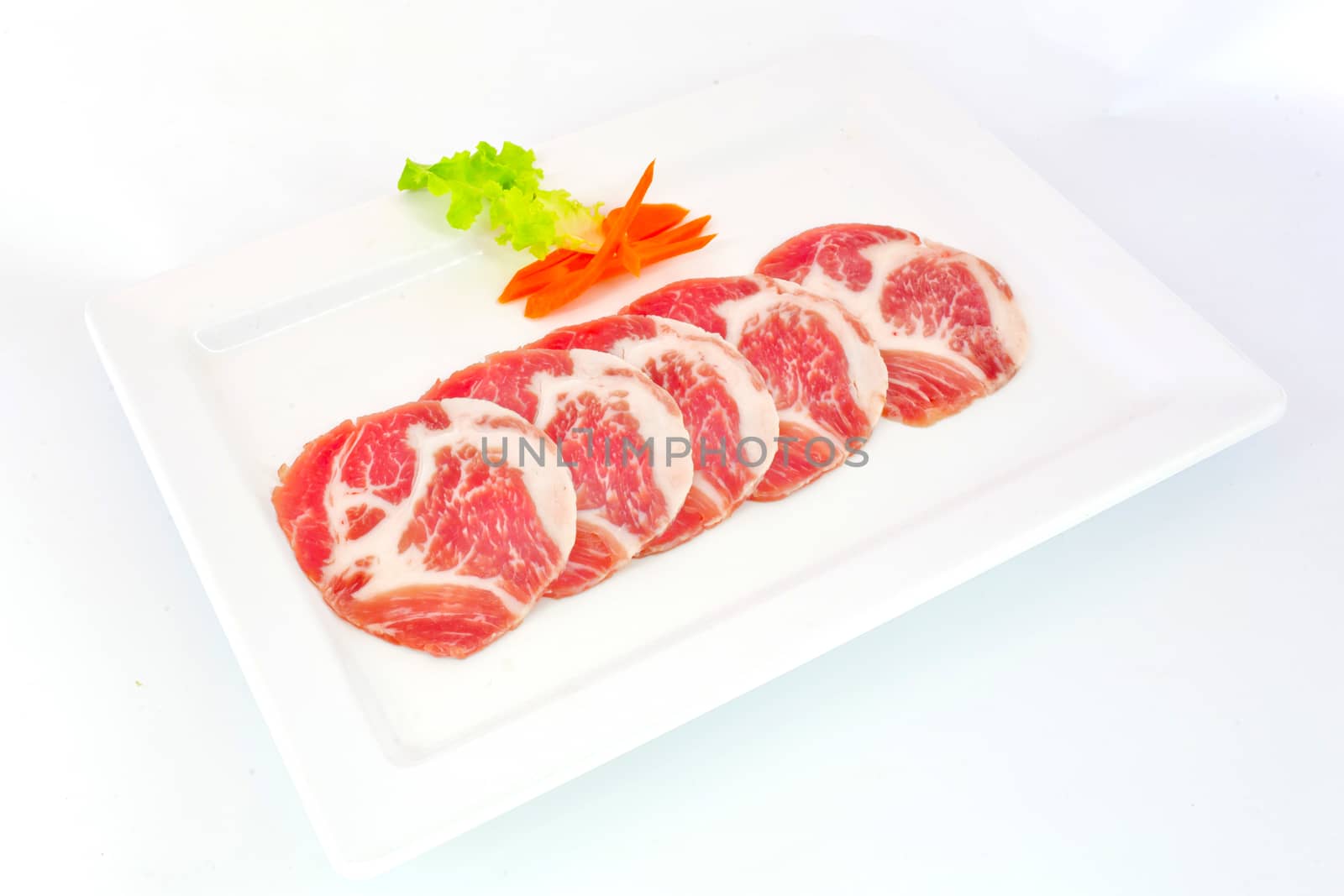 freshness slided pork on white dish for grill