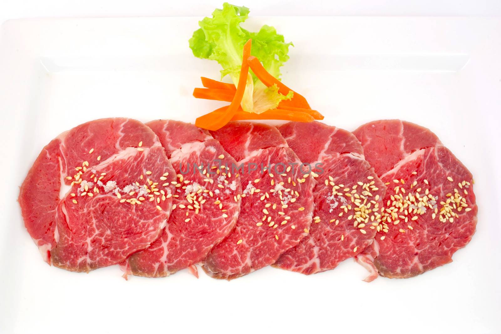 High grade sliced Hida wagyu beef isolated on white background
