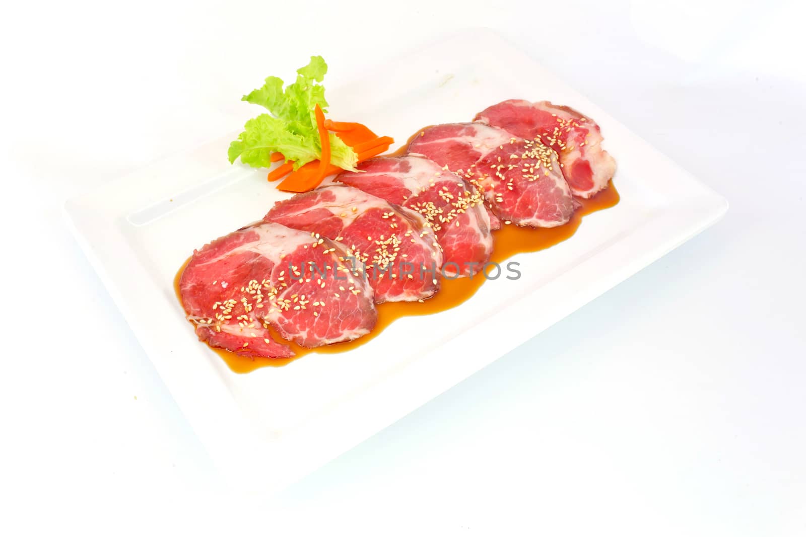 freshness slided pork on white dish for grill