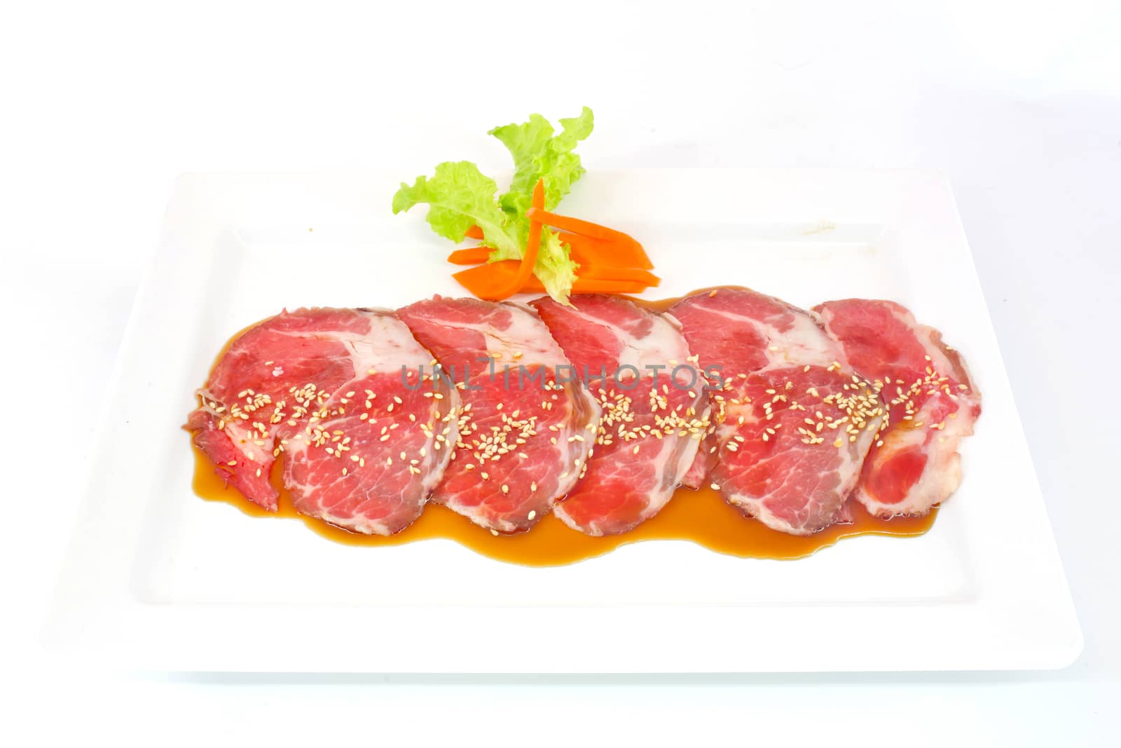freshness slided pork on white dish for grill