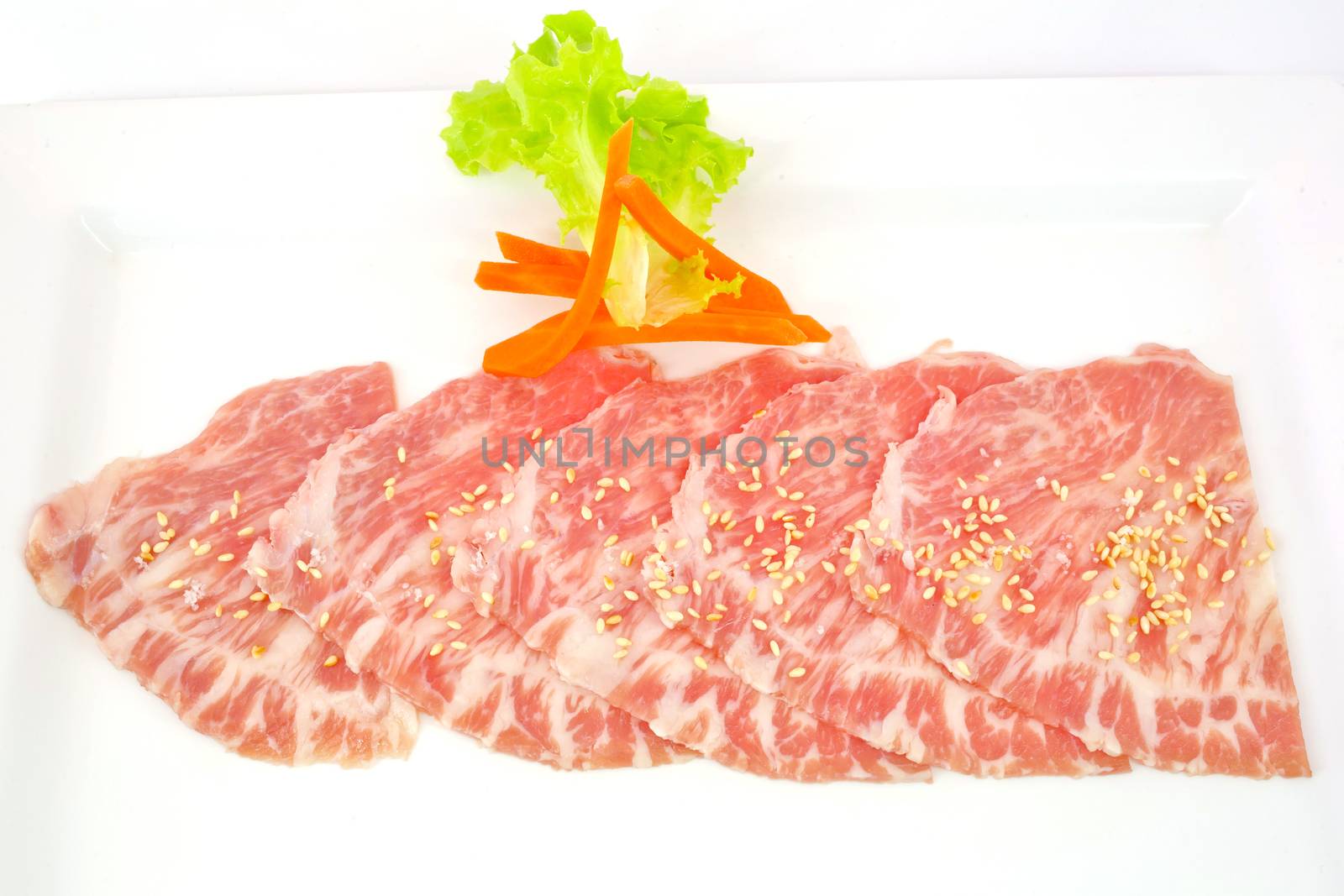 High grade sliced Hida wagyu beef isolated on white background