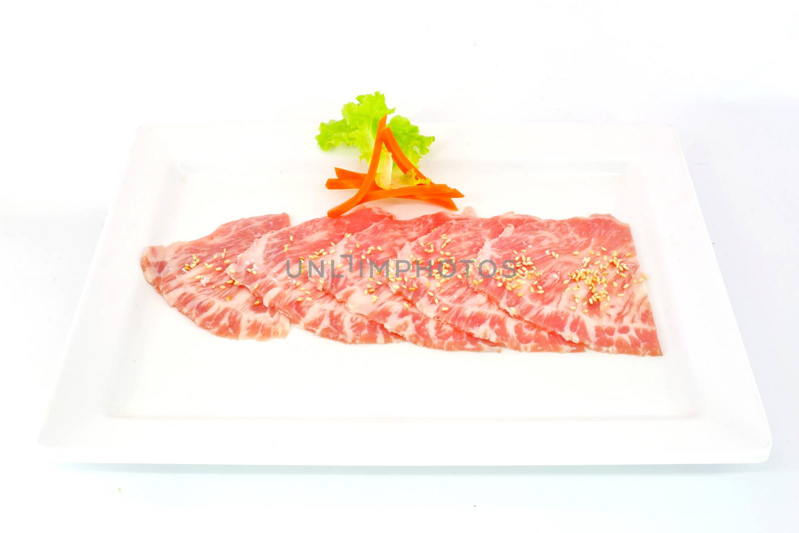 High grade sliced Hida wagyu beef isolated on white background