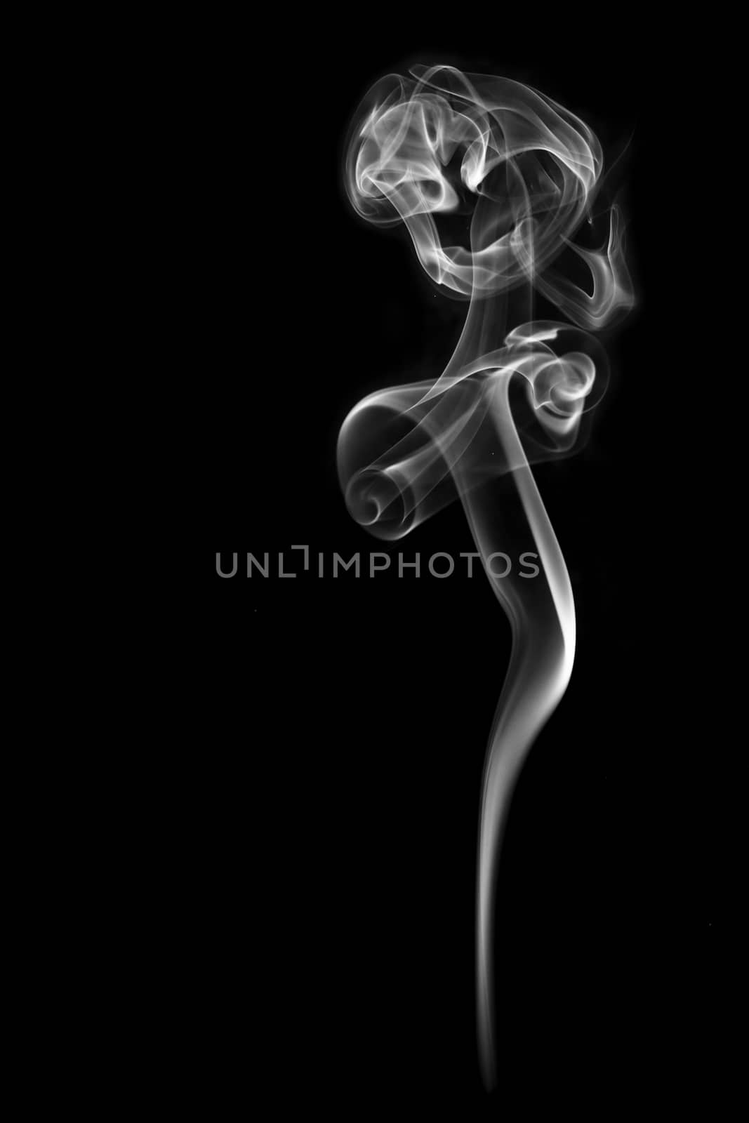 illuminated smoke that propagates on a black background