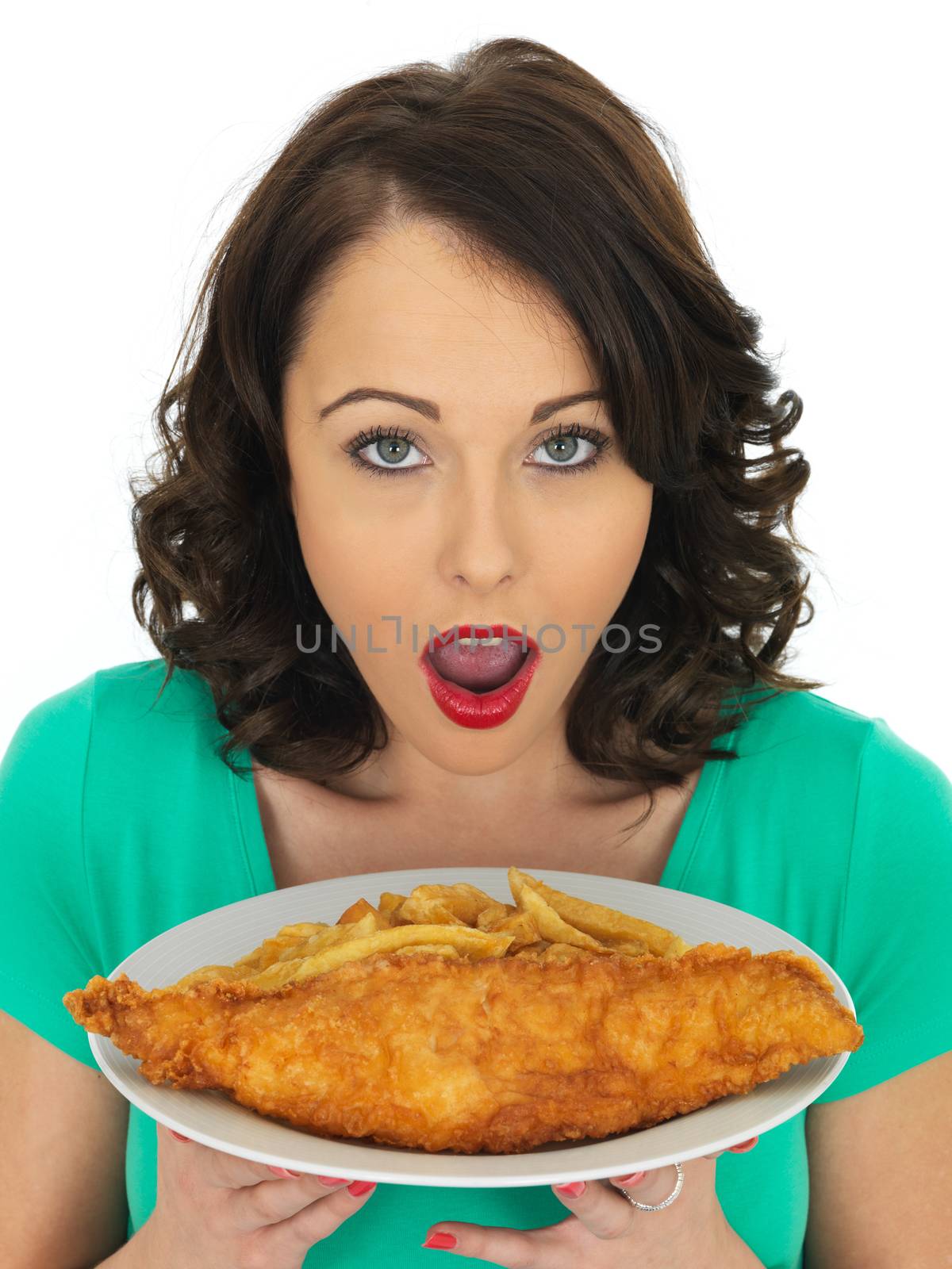 Attractive Young Woman Eating Traditional Fish and Chips
