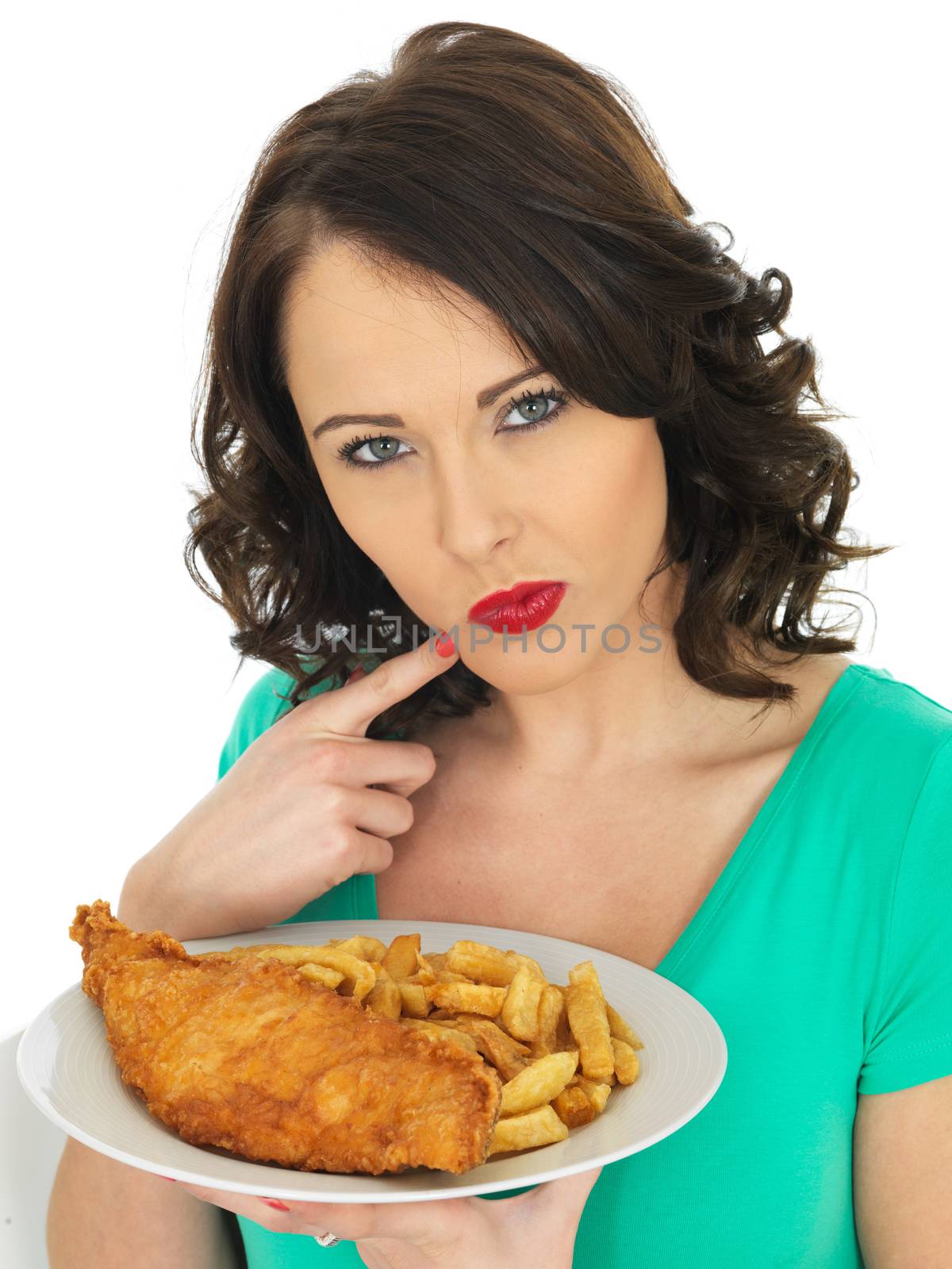 Young Woman Eating Traditional Fish and Chips by Whiteboxmedia