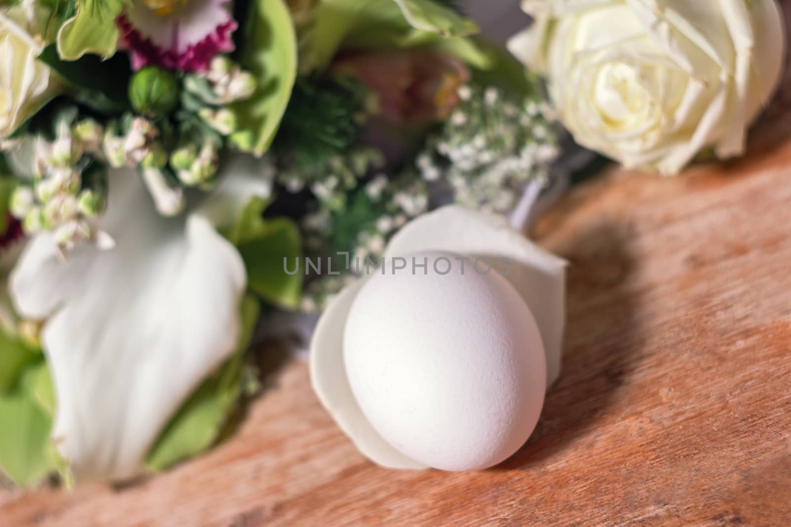 egg white in the middle of a bouquet of flowers