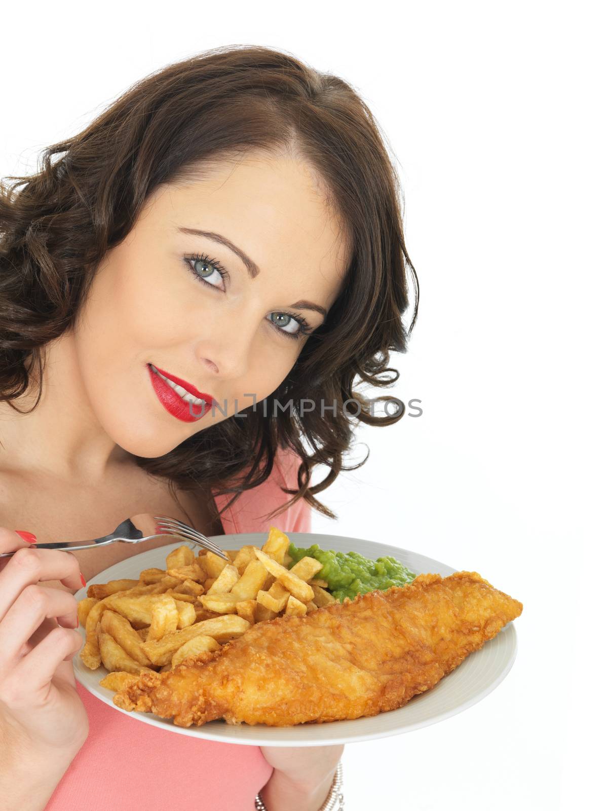 Young Woman Eating Fish and Chips with Mushy Peas by Whiteboxmedia