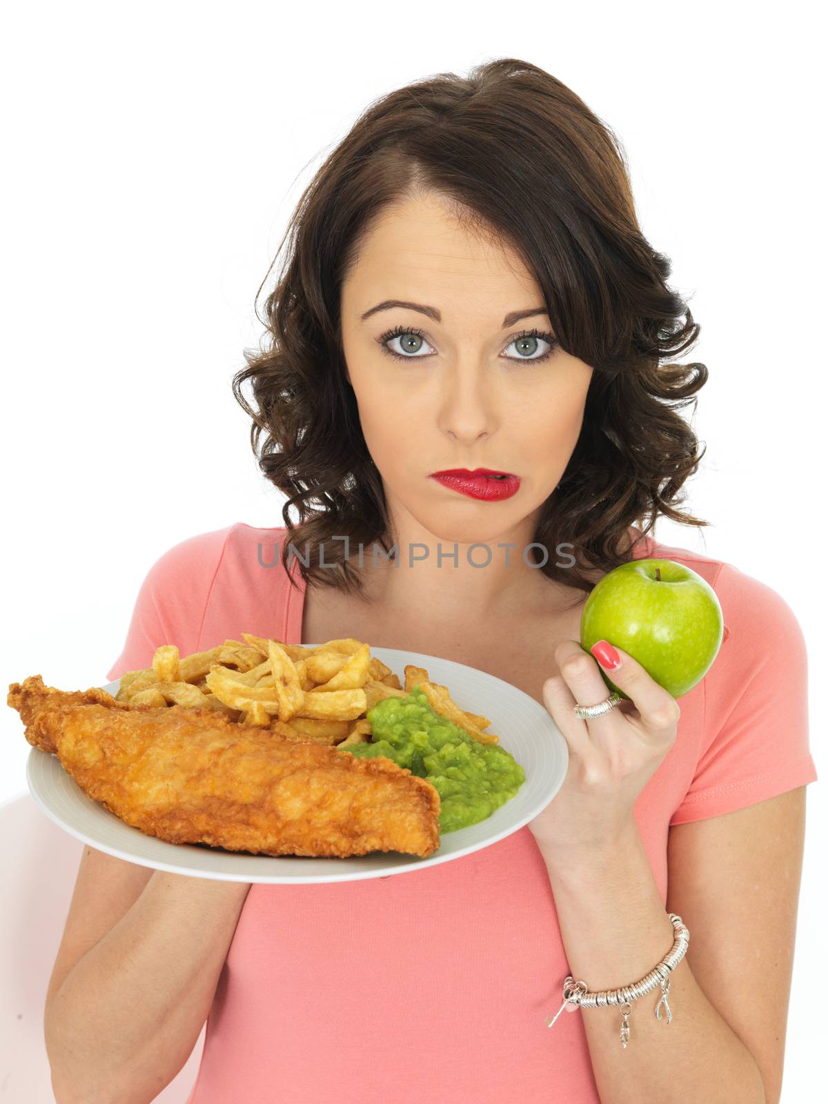 Young Attractive Woman Eating Fish and Chips with Mushy Peas