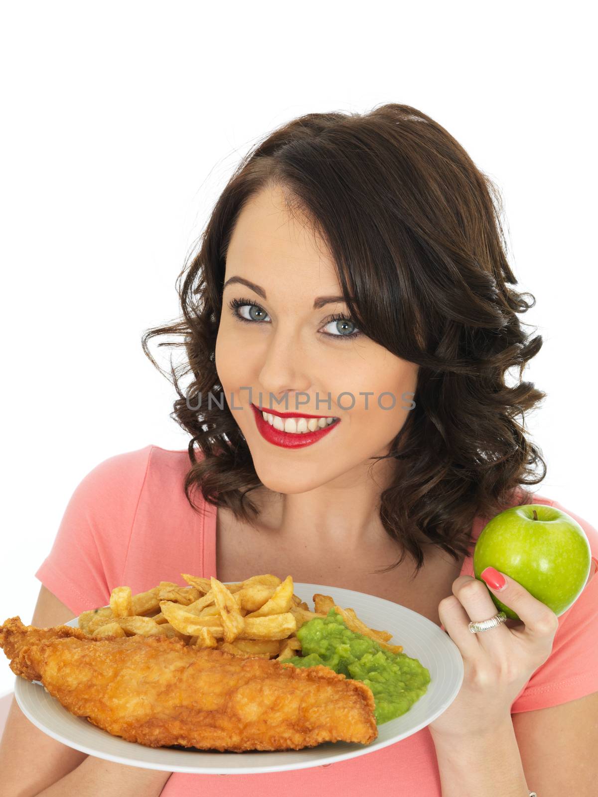 Young Attractive Woman Eating Fish and Chips with Mushy Peas