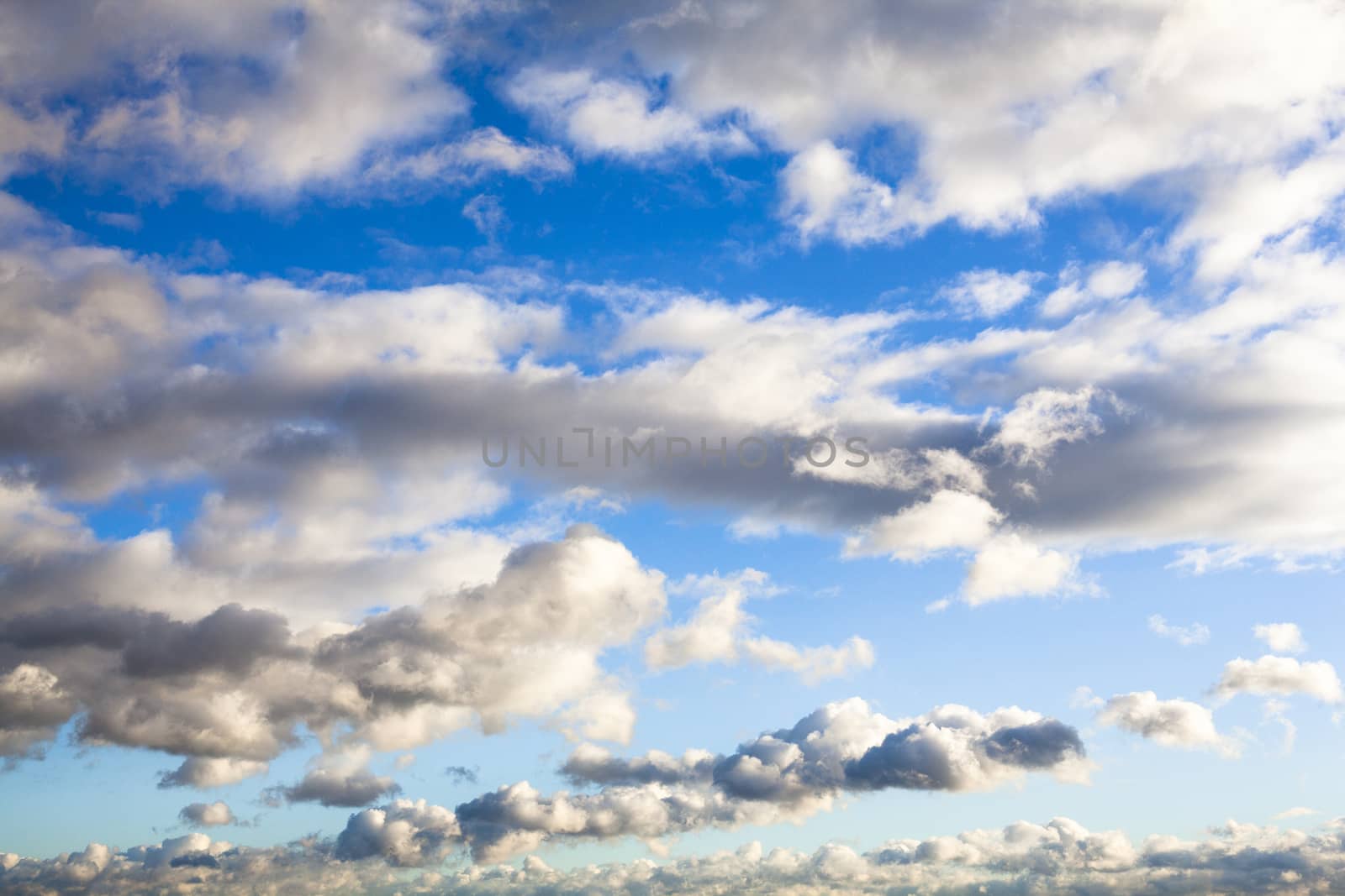 Cloudscape. Blue sky with lots of clouds.