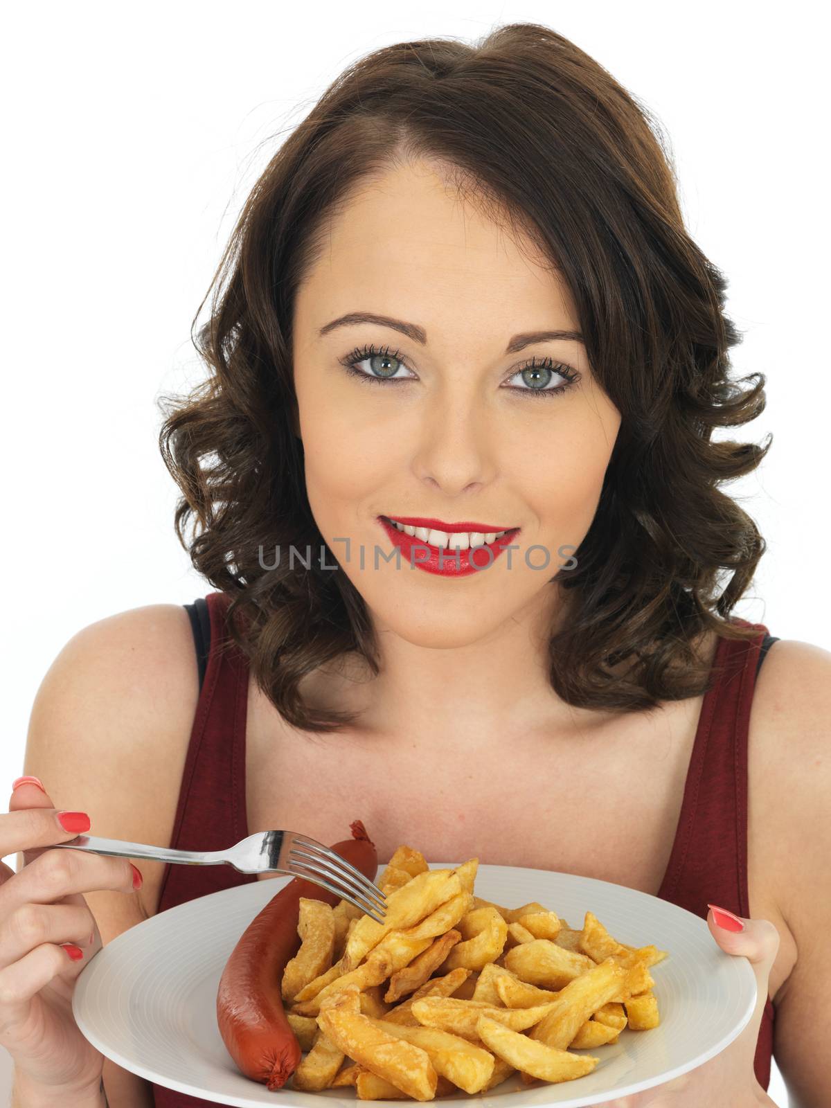 Young Woman Eating Saveloy Sausage with Chips by Whiteboxmedia