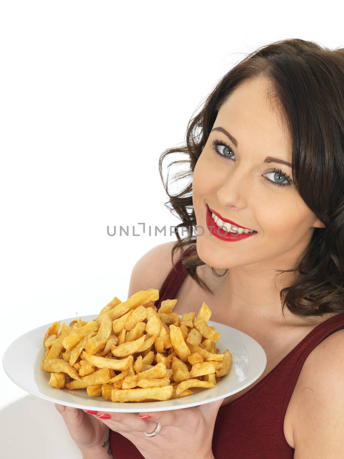 Young Woman Eating a Large Plate of Fried Chips by Whiteboxmedia