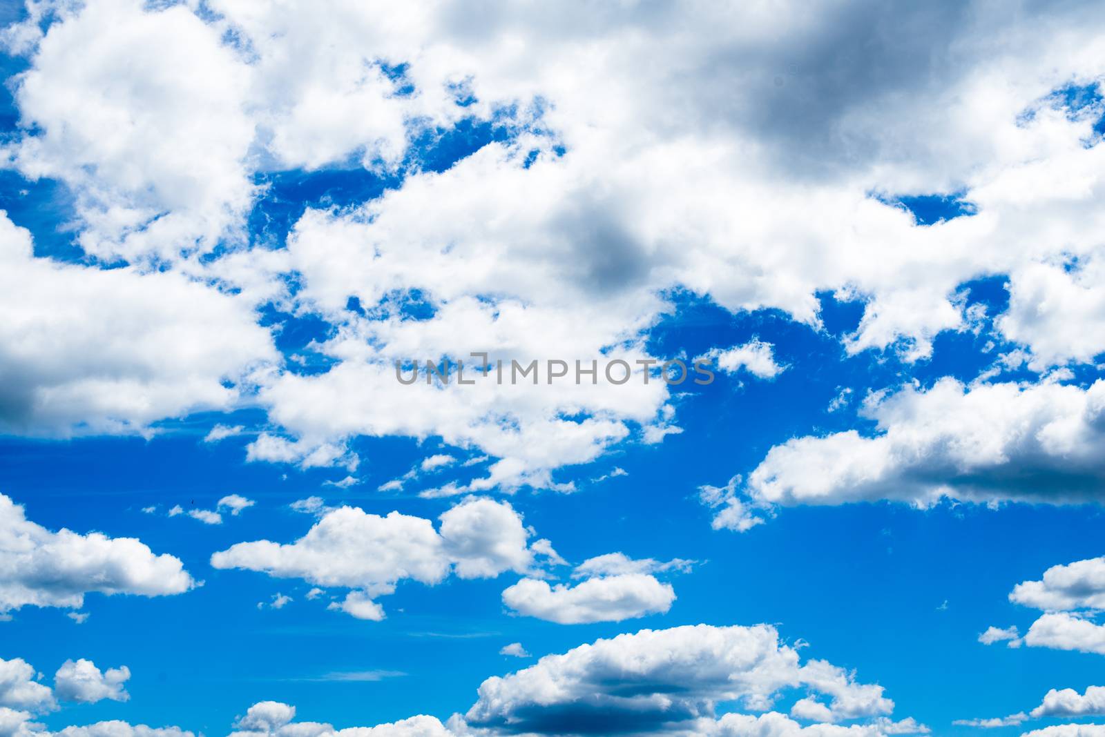 Blue sky with lots of white clouds