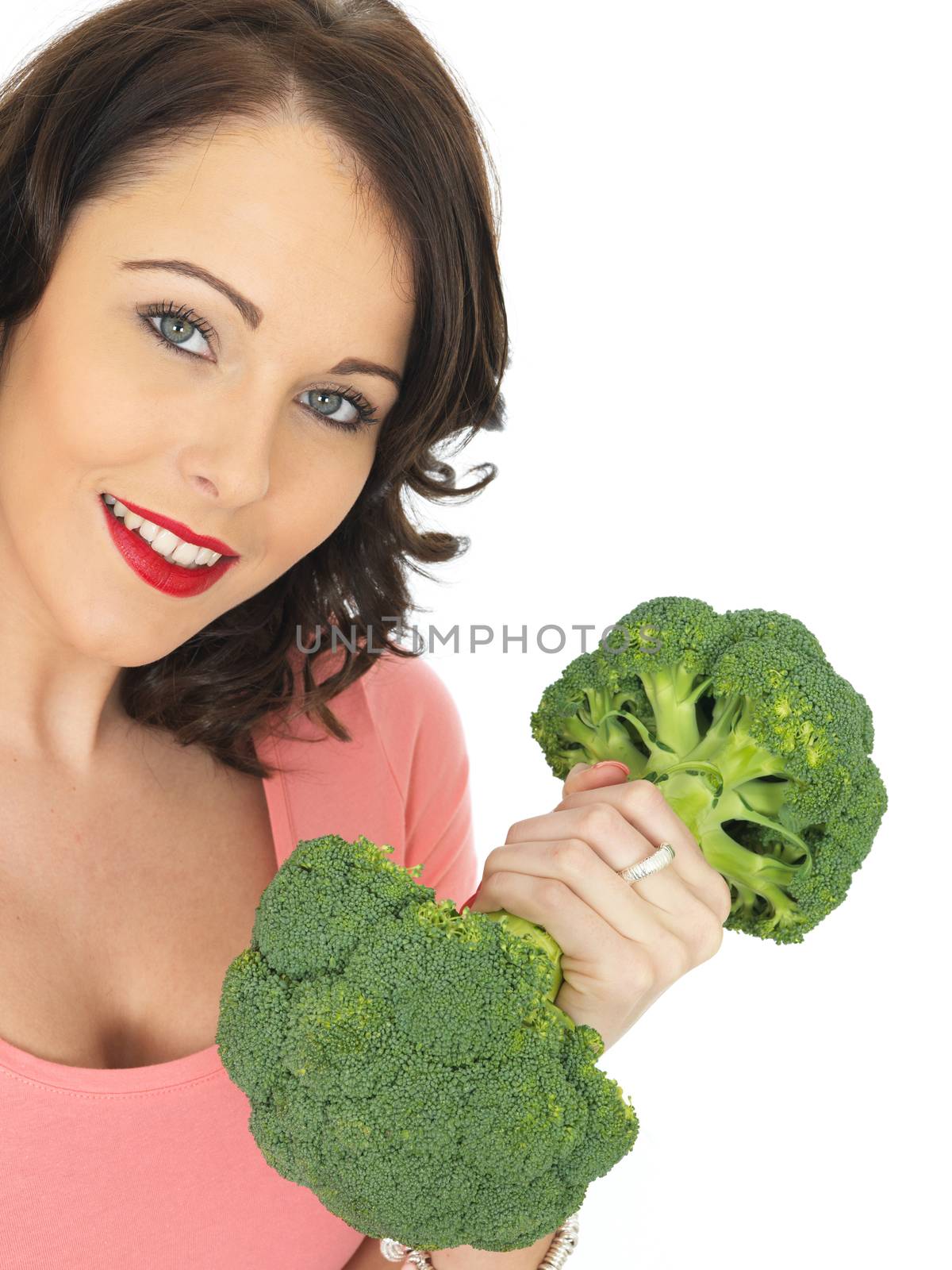 Young Attractive Woman Holding Raw Broccoli
