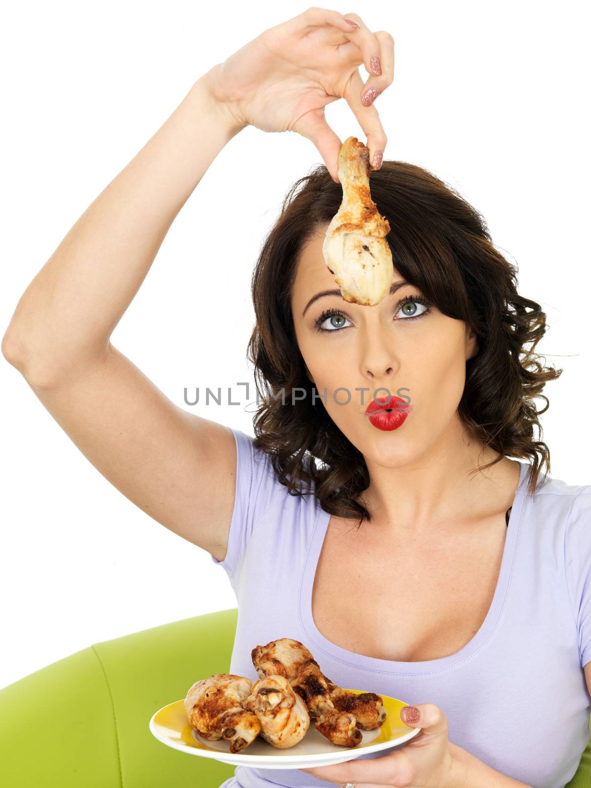 Young Healthy Woman Eating Cold Cooked Chicken Legs