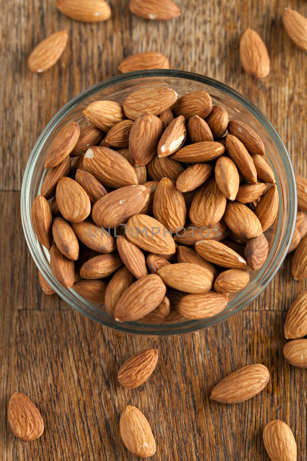 Organic almonds in raw form unroasted and unsalted.  Close up macro still life with a shallow depth of field.