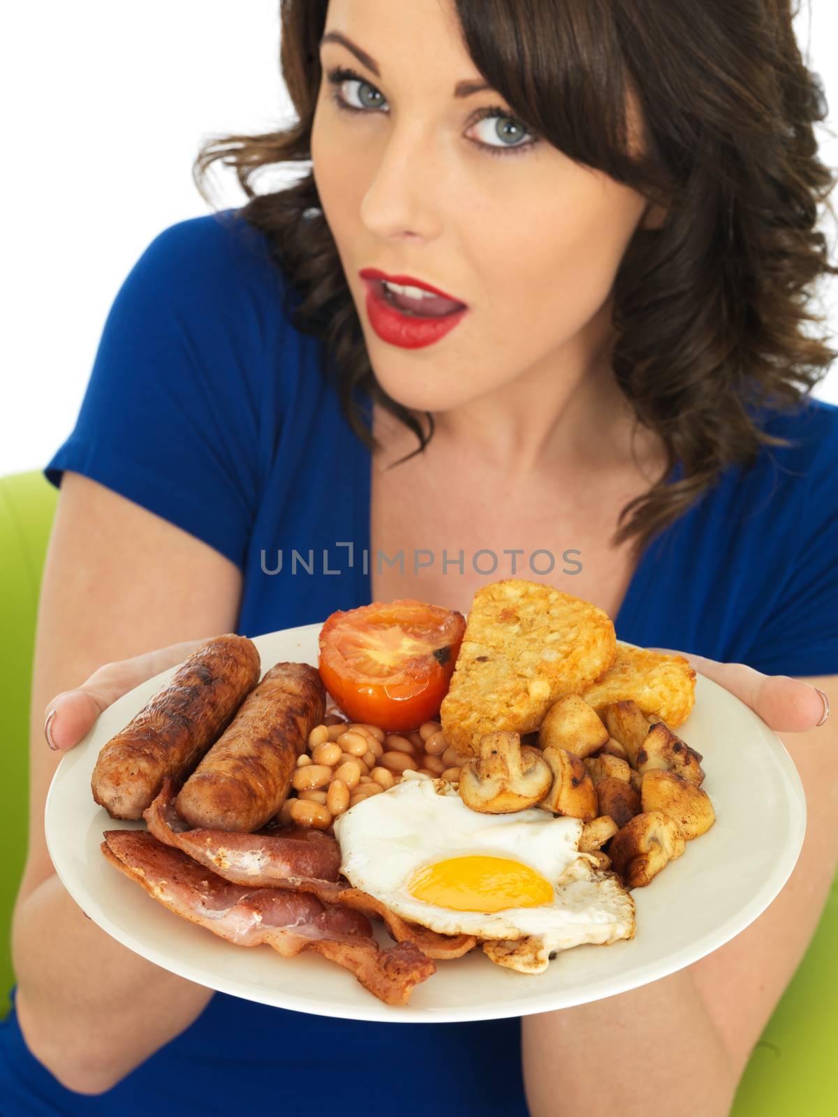 Young Attractive Woman Eating a Full English Breakfast