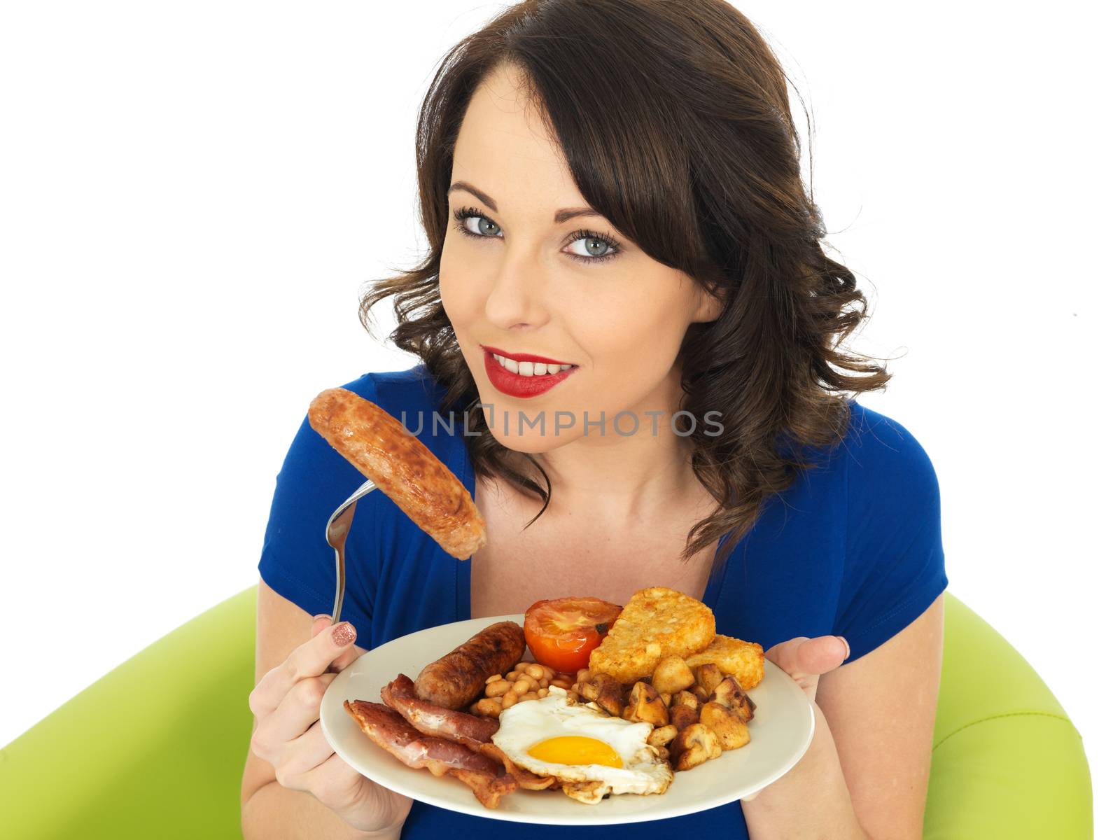 Young Woman Eating a Full English Breakfast by Whiteboxmedia