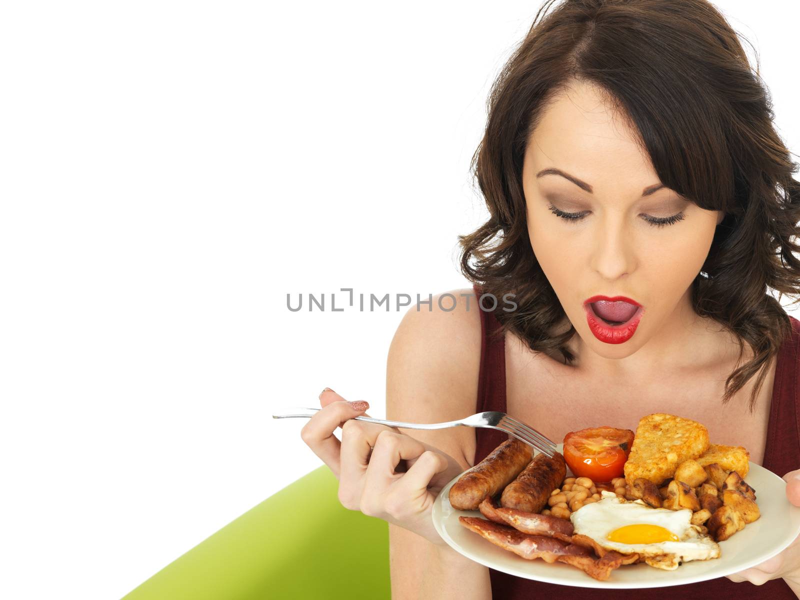 Young Woman Eating a Full English Breakfast by Whiteboxmedia