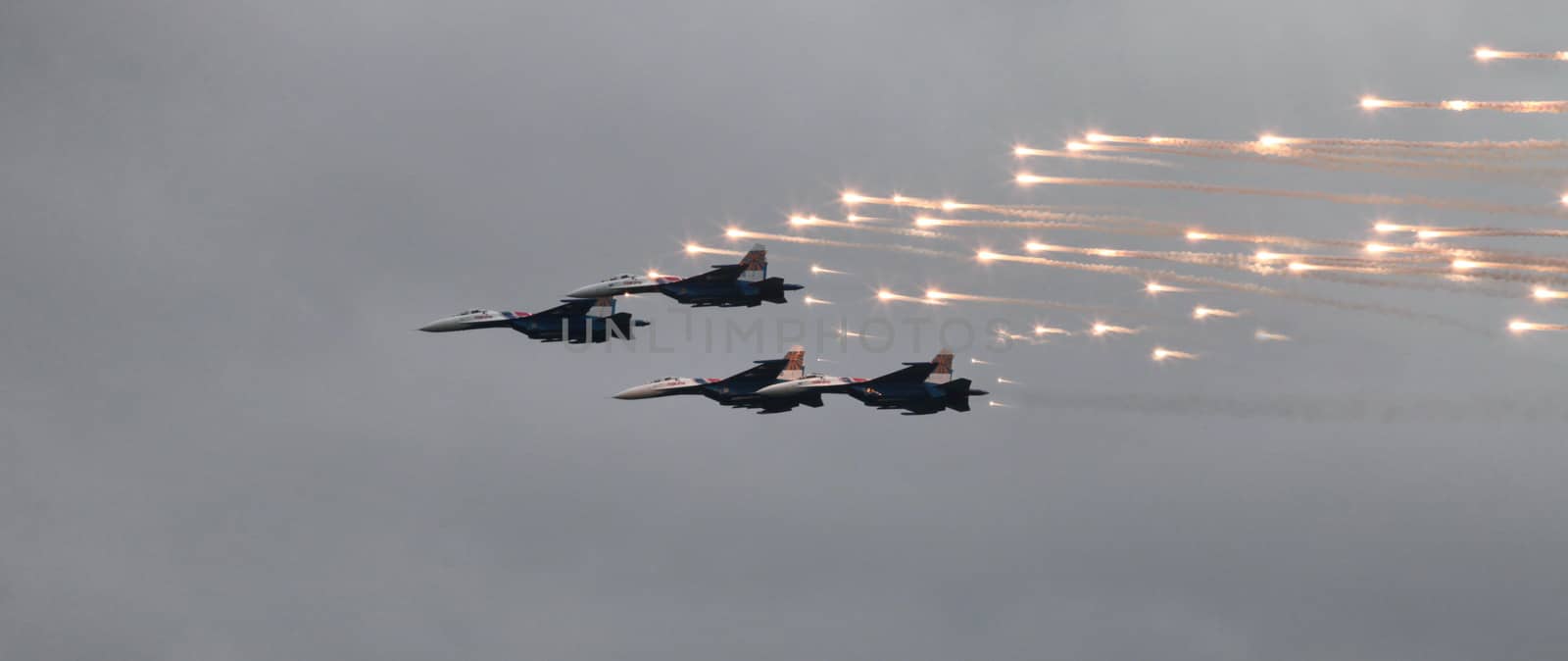 Aerobatic team 'Swifts' on the MiG-29 fighter fires a missile thermal