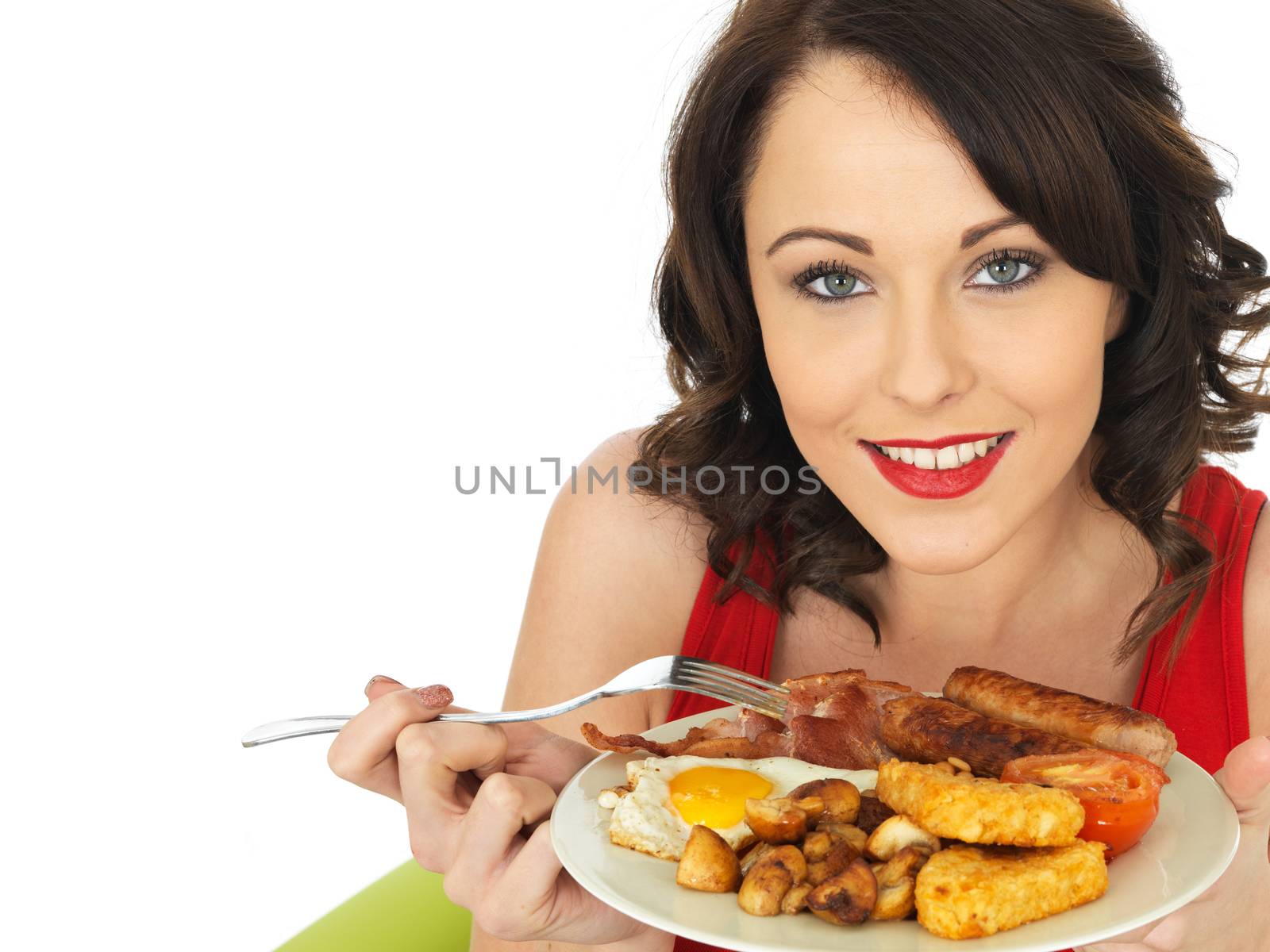 Young Attractive Woman Eating a Full English Breakfast