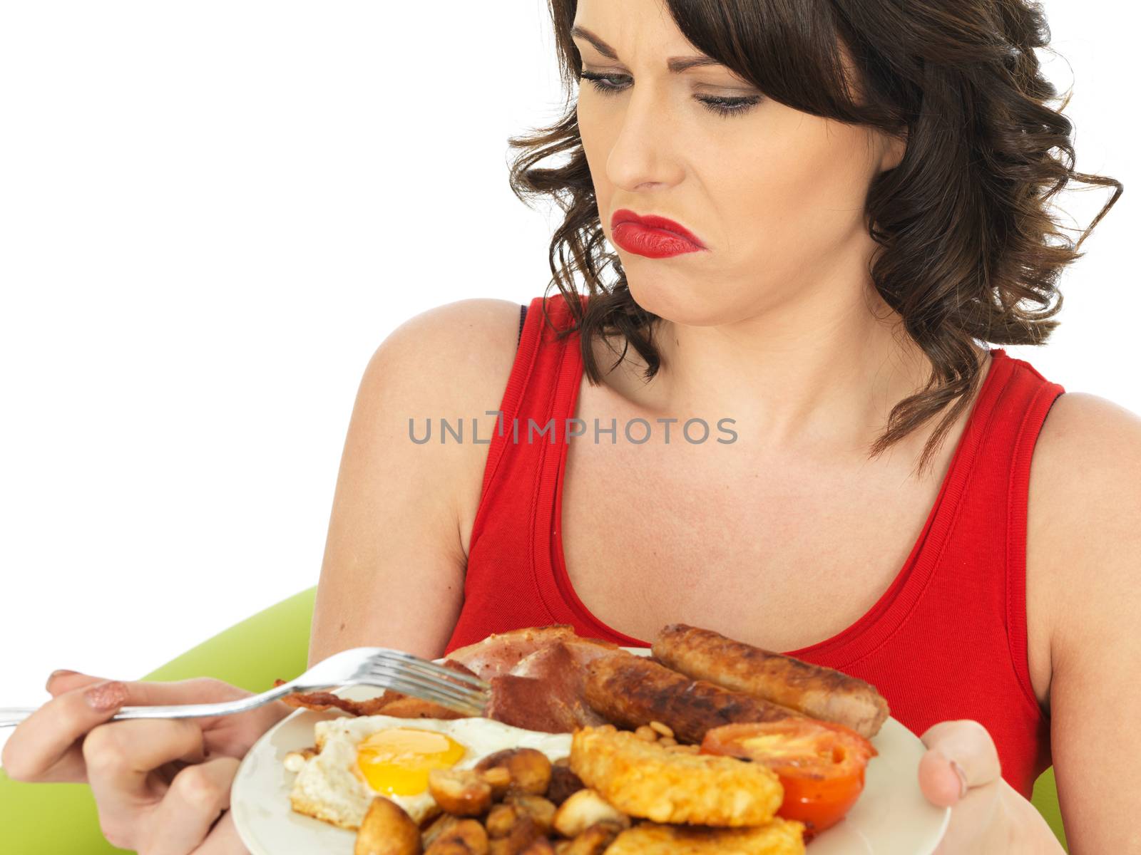 Young Attractive Woman Eating a Full English Breakfast