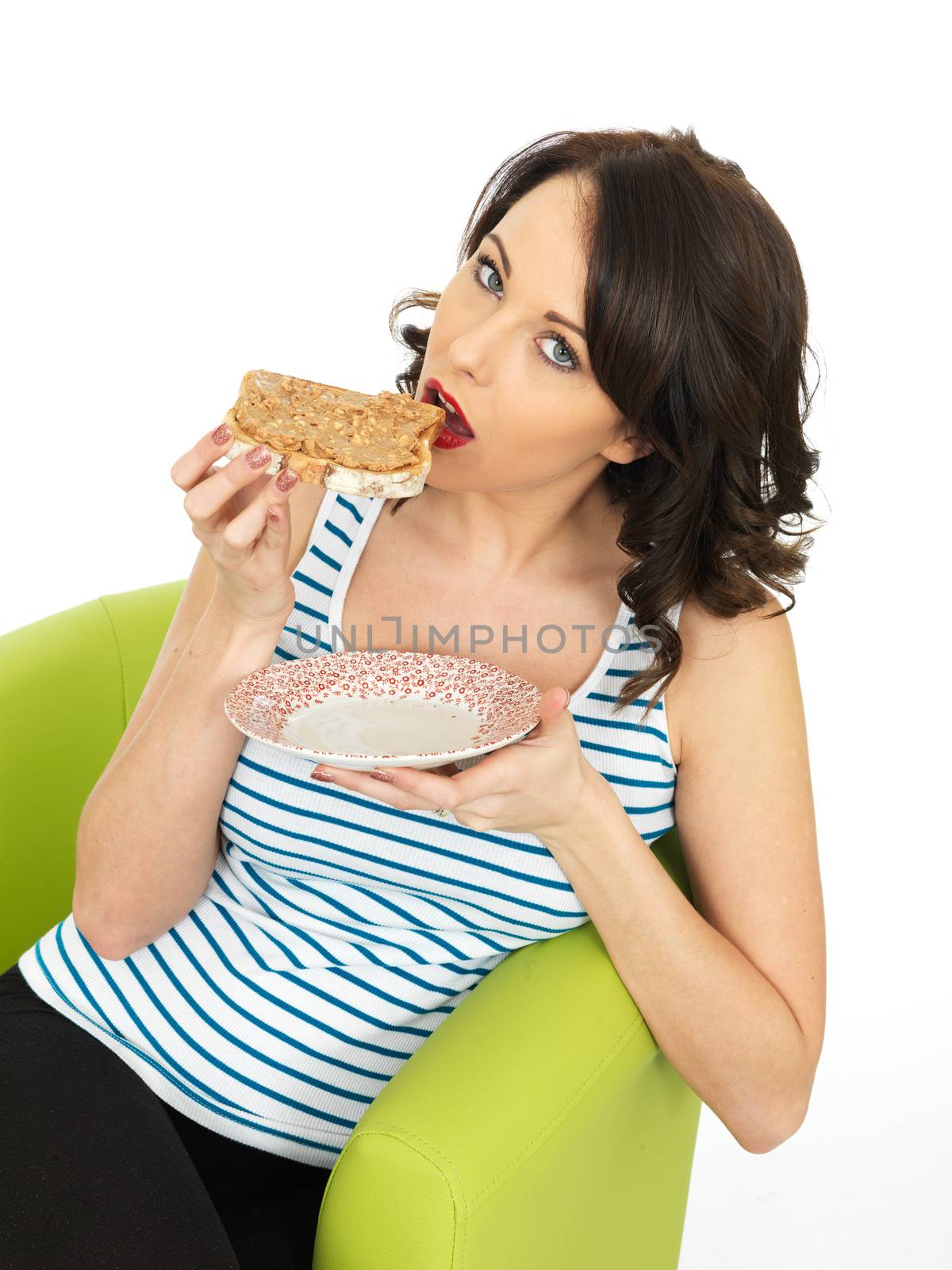 Young Healthy Woman Holding Toast with Crunchy Peanut Butter