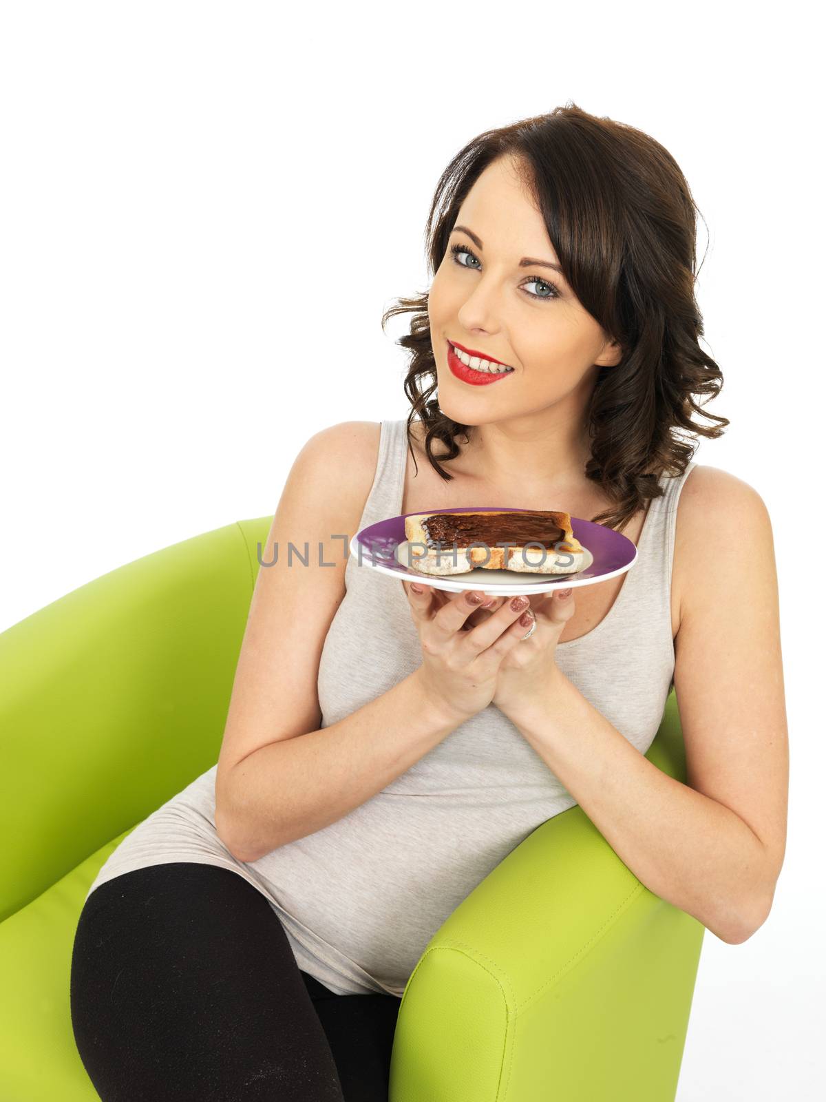 Healthy Young Woman Holding Toast Spread with Yeast Extract