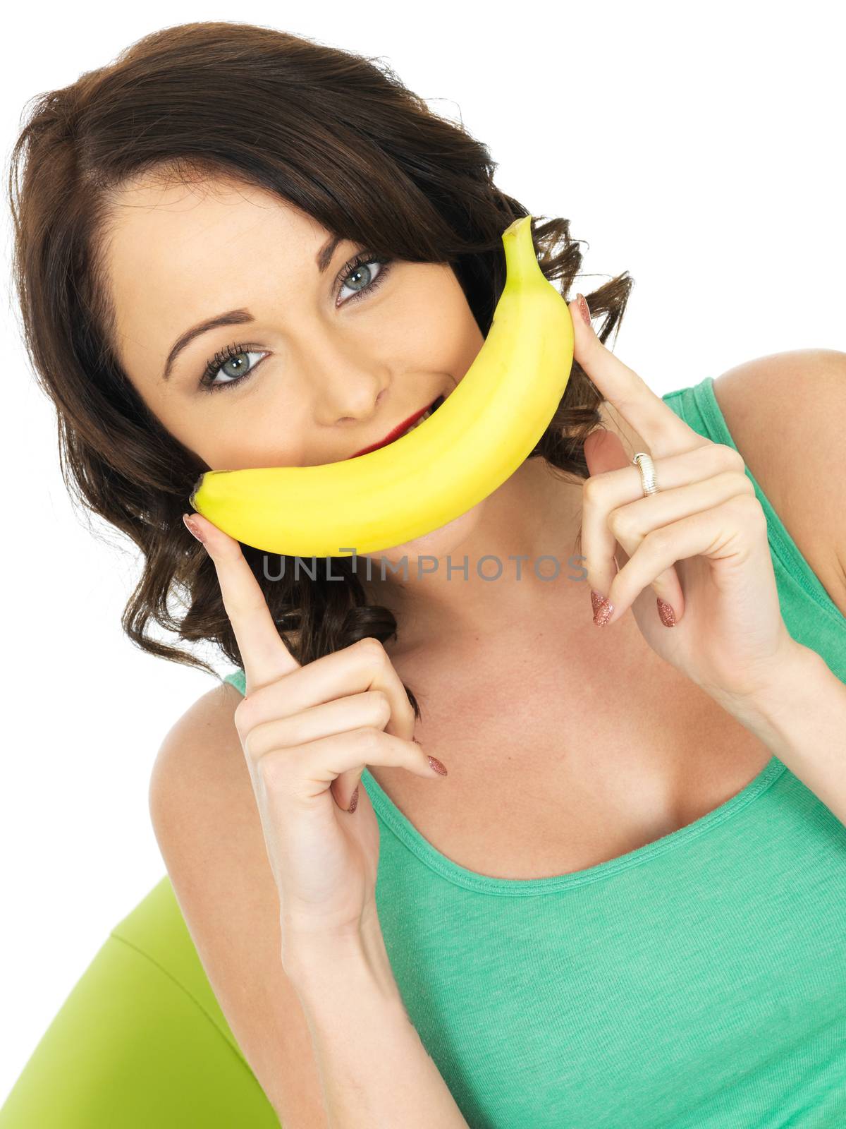 Young Woman Holding a Banana by Whiteboxmedia