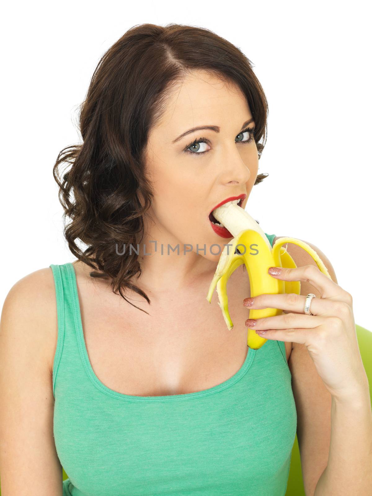 Healthy Young Woman Eating a Banana