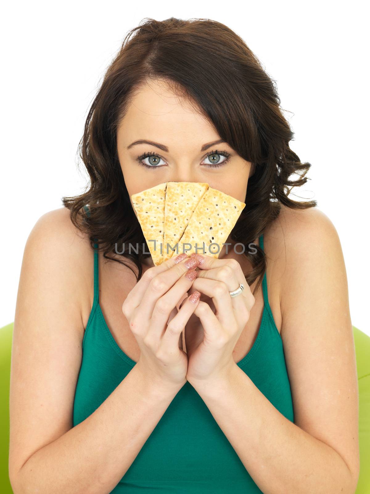 Young Healthy Woman Eating Crispy Thin Crackers