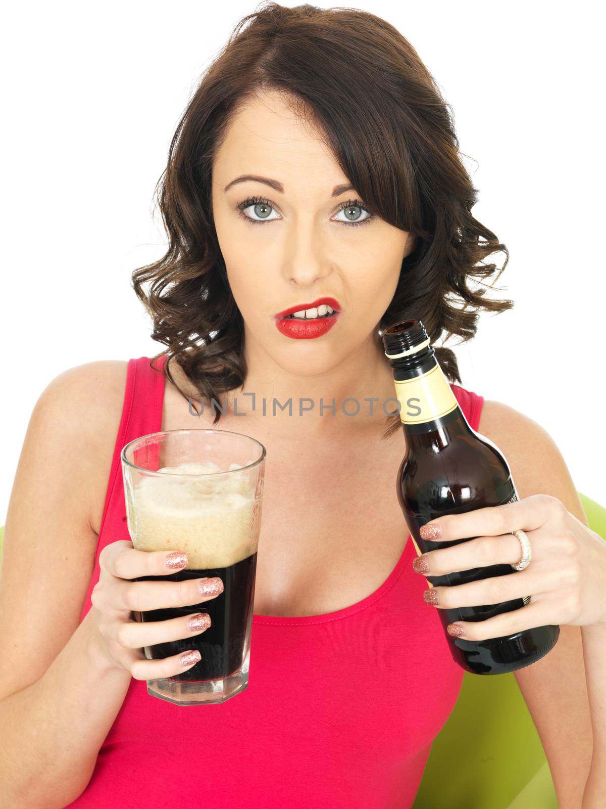 Attractive Young Woman Drinking Beer by Whiteboxmedia