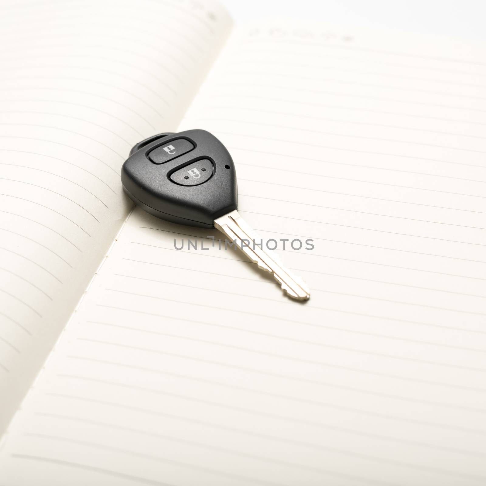 car key on notebook by ammza12