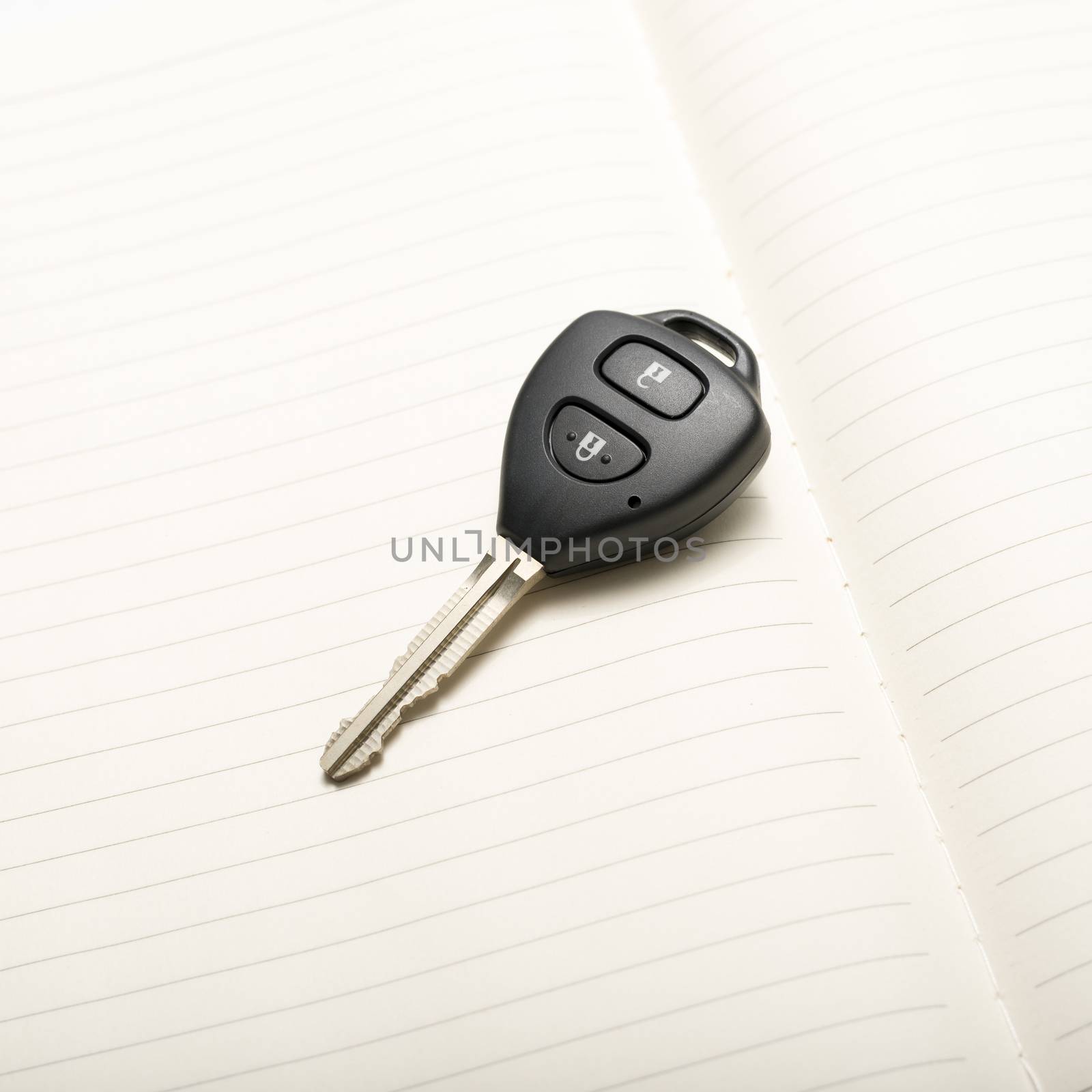car key on notebook by ammza12