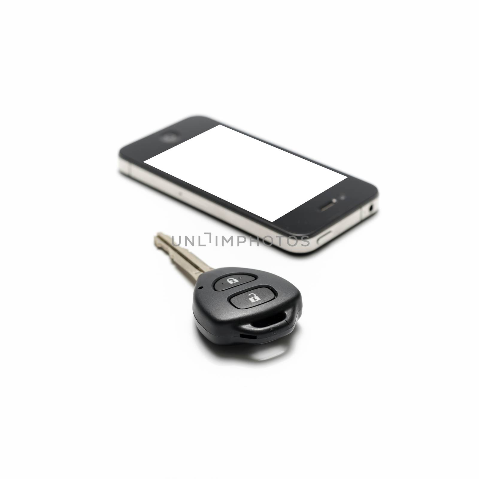 car key with smart phone isolated on white background