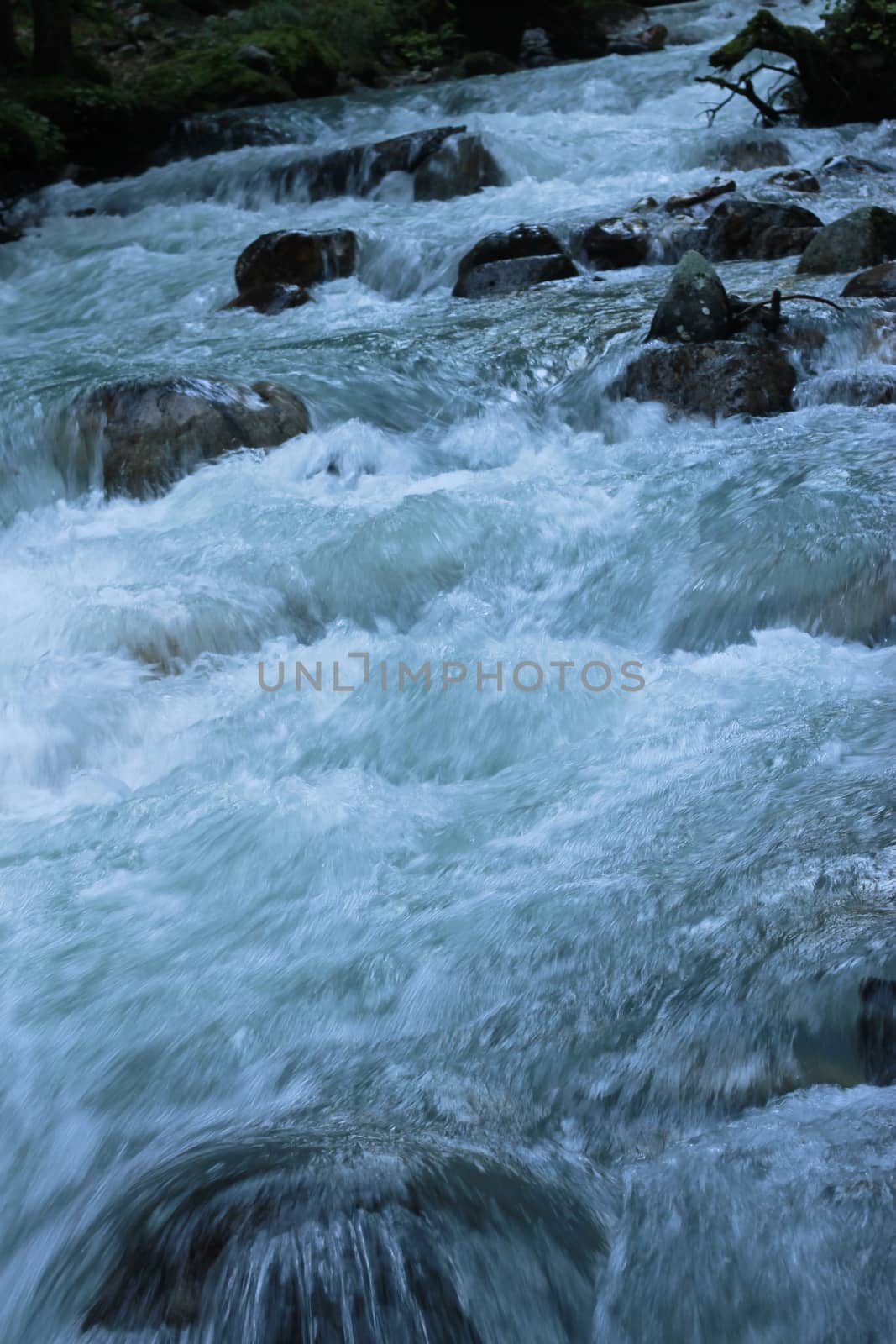 Mountain river run away after the sunset