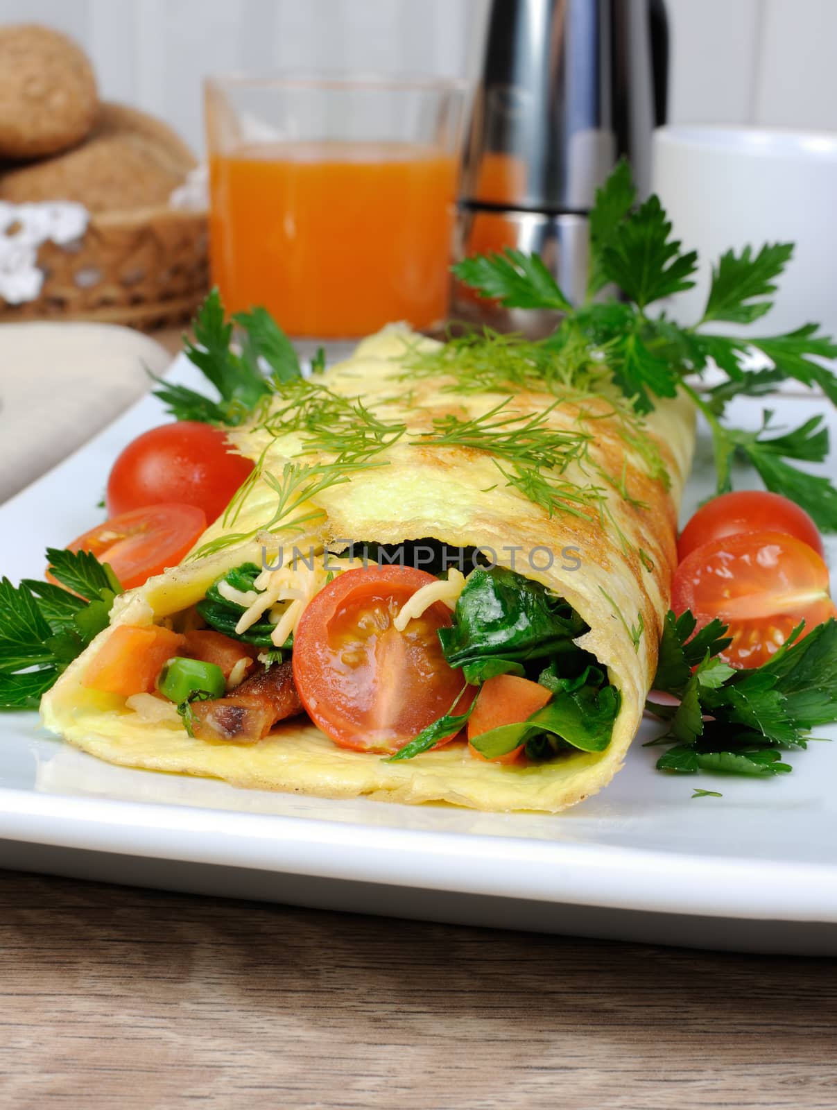 Omelet stuffed vegetables with herbs and tomatoes