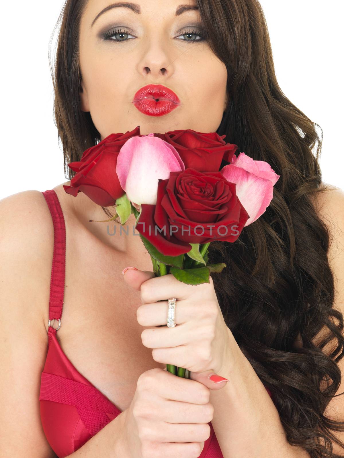 Sexy Young Woman Wearing Red Lingerie and Holding Red Roses by Whiteboxmedia